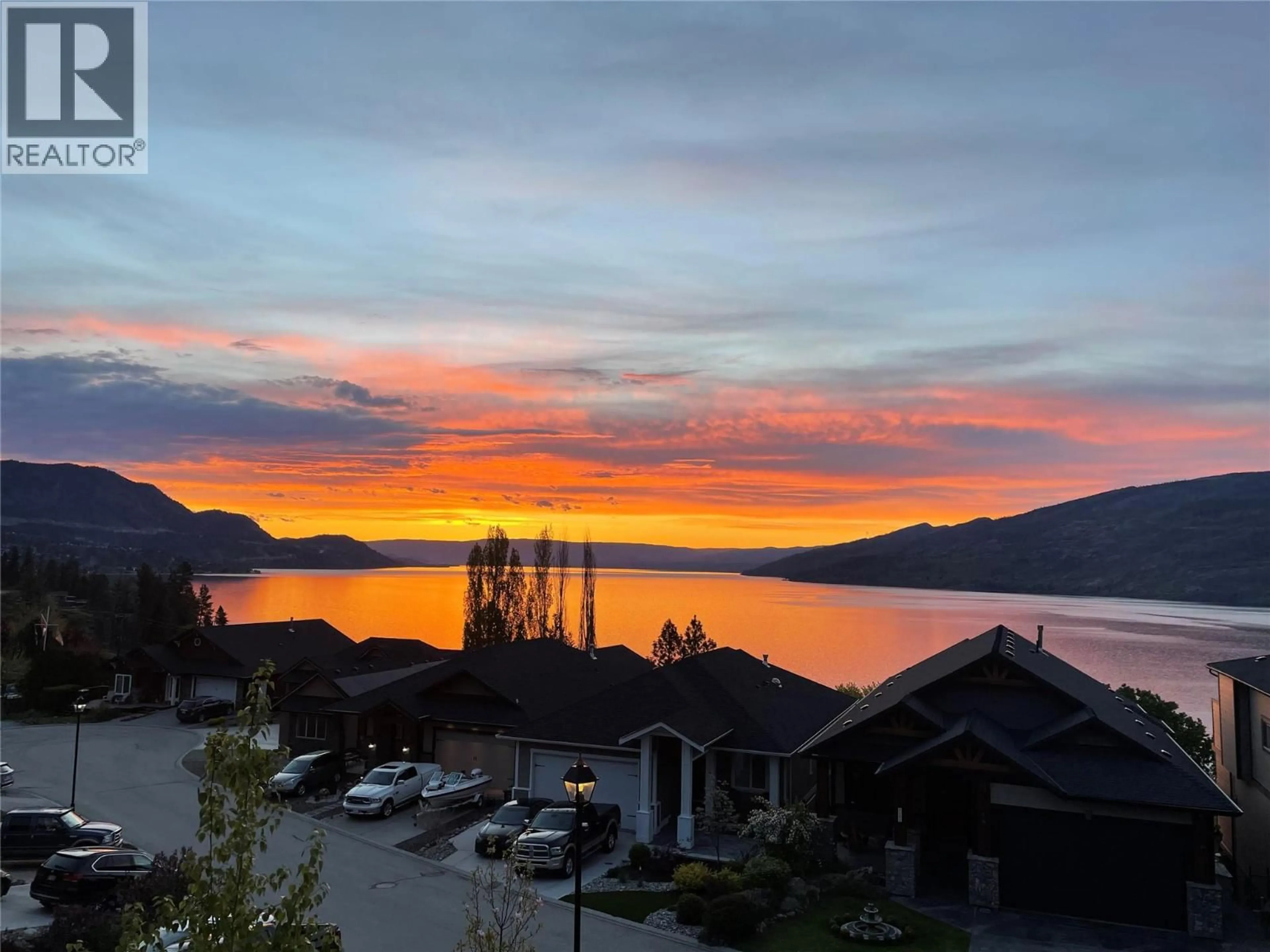 A pic from outside/outdoor area/front of a property/back of a property/a pic from drone, water/lake/river/ocean view for 1 - 6267 SUNDSTROM COURT, Peachland British Columbia V0H1X7