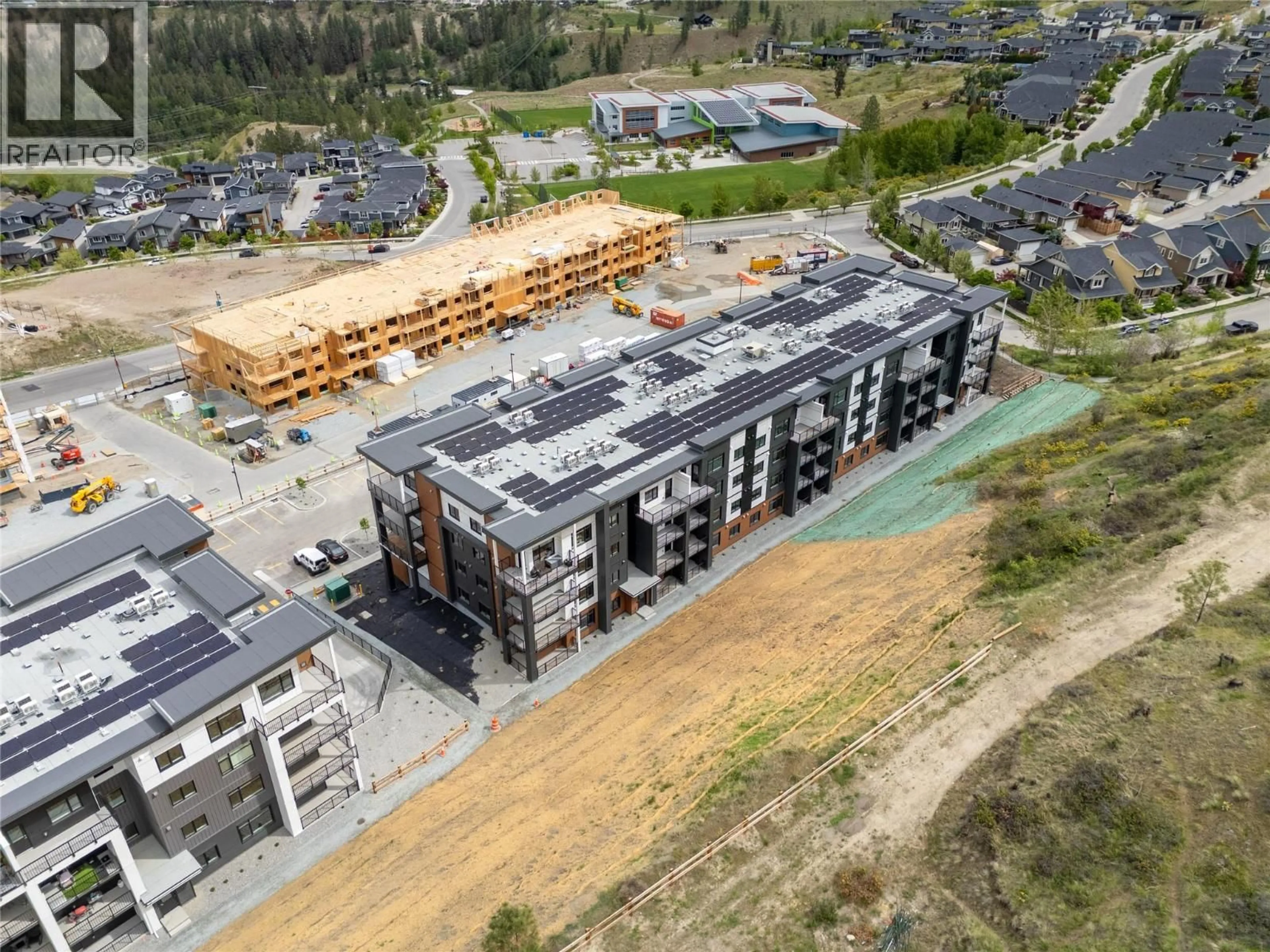 A pic from outside/outdoor area/front of a property/back of a property/a pic from drone, building for 304 - 1111 FROST ROAD, Kelowna British Columbia V1W0G8