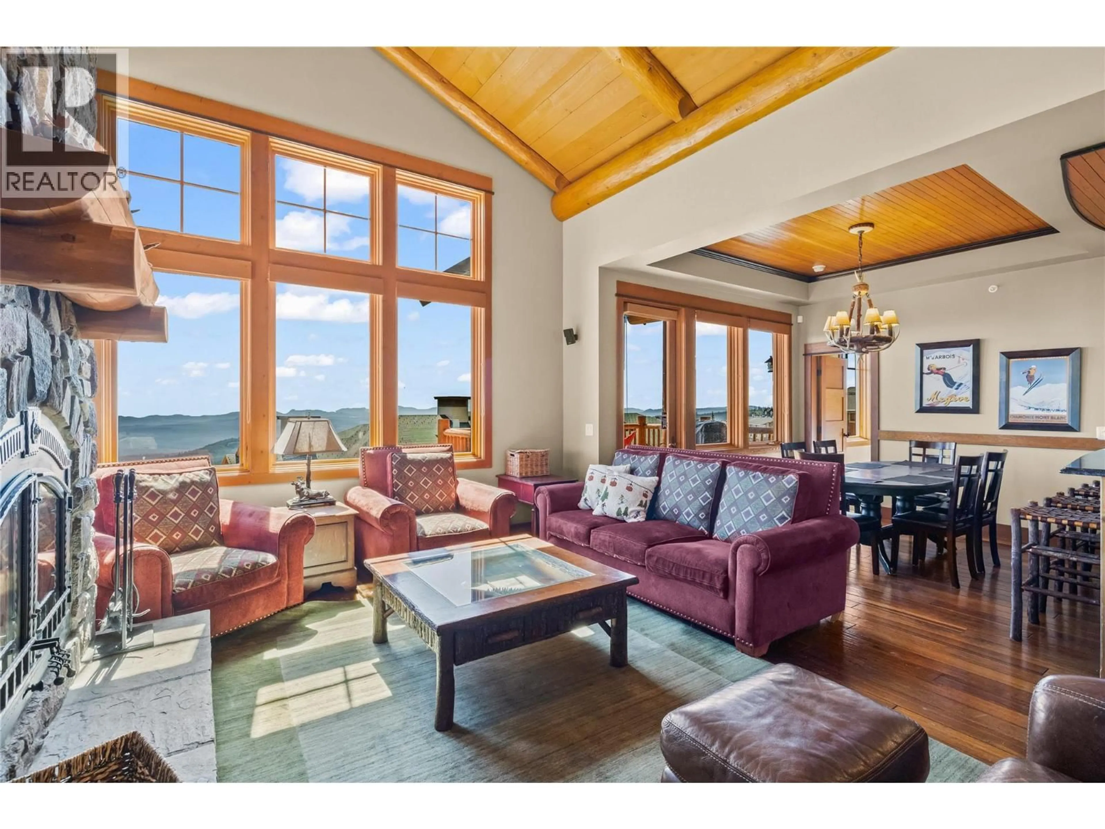 Living room with furniture, wood/laminate floor for 7 - 255 FEATHERTOP WAY, Kelowna British Columbia V1P1P3