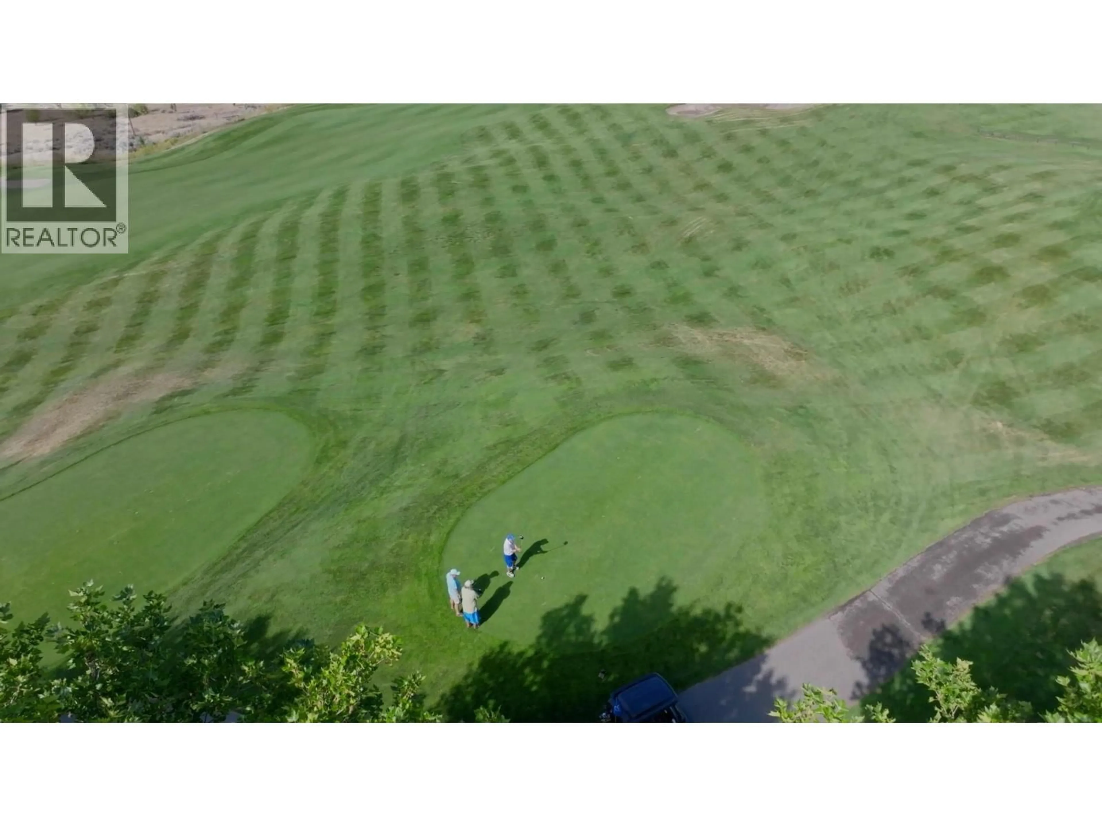 A pic from outside/outdoor area/front of a property/back of a property/a pic from drone, unknown for 1312 - 1000 TALASA WAY, Kamloops British Columbia V2H0C2