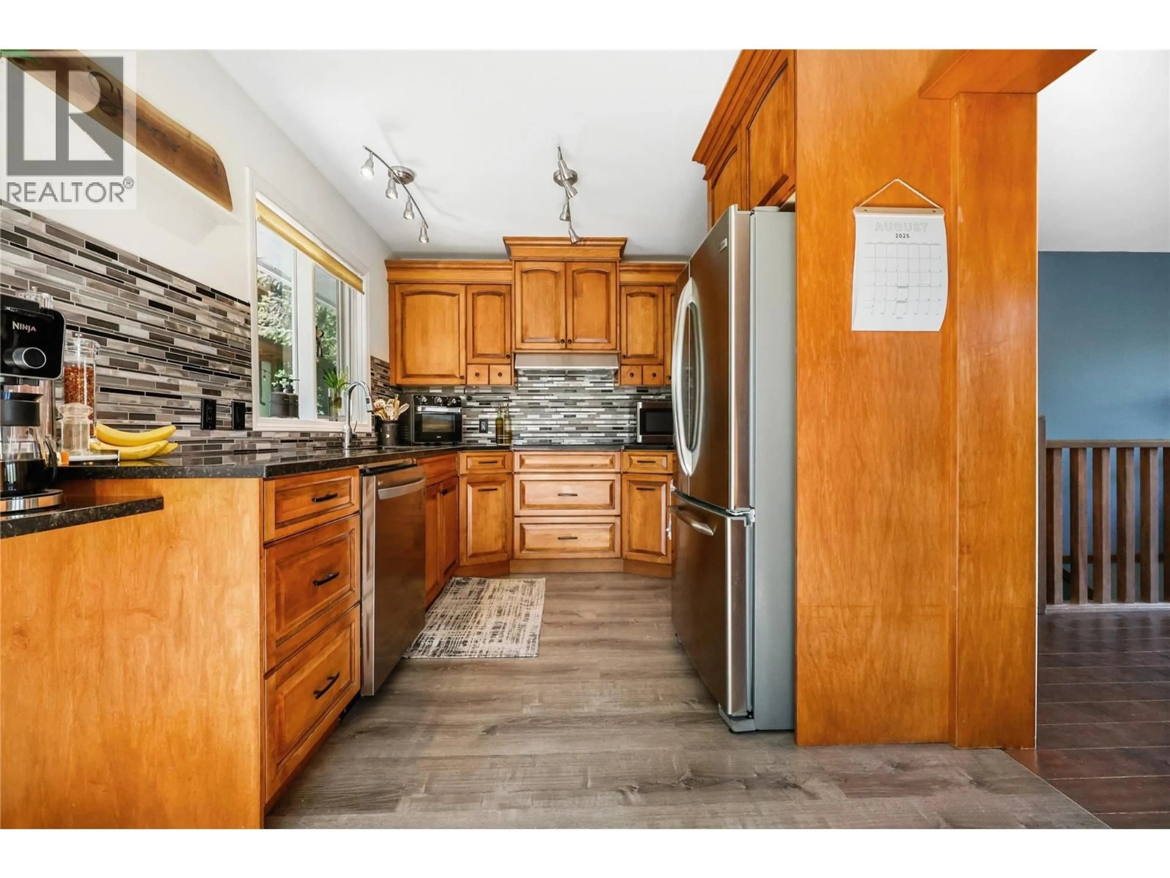 Open concept kitchen, ceramic/tile floor for 1632 WEST KELOWNA ROAD, West Kelowna British Columbia V1Z3B7