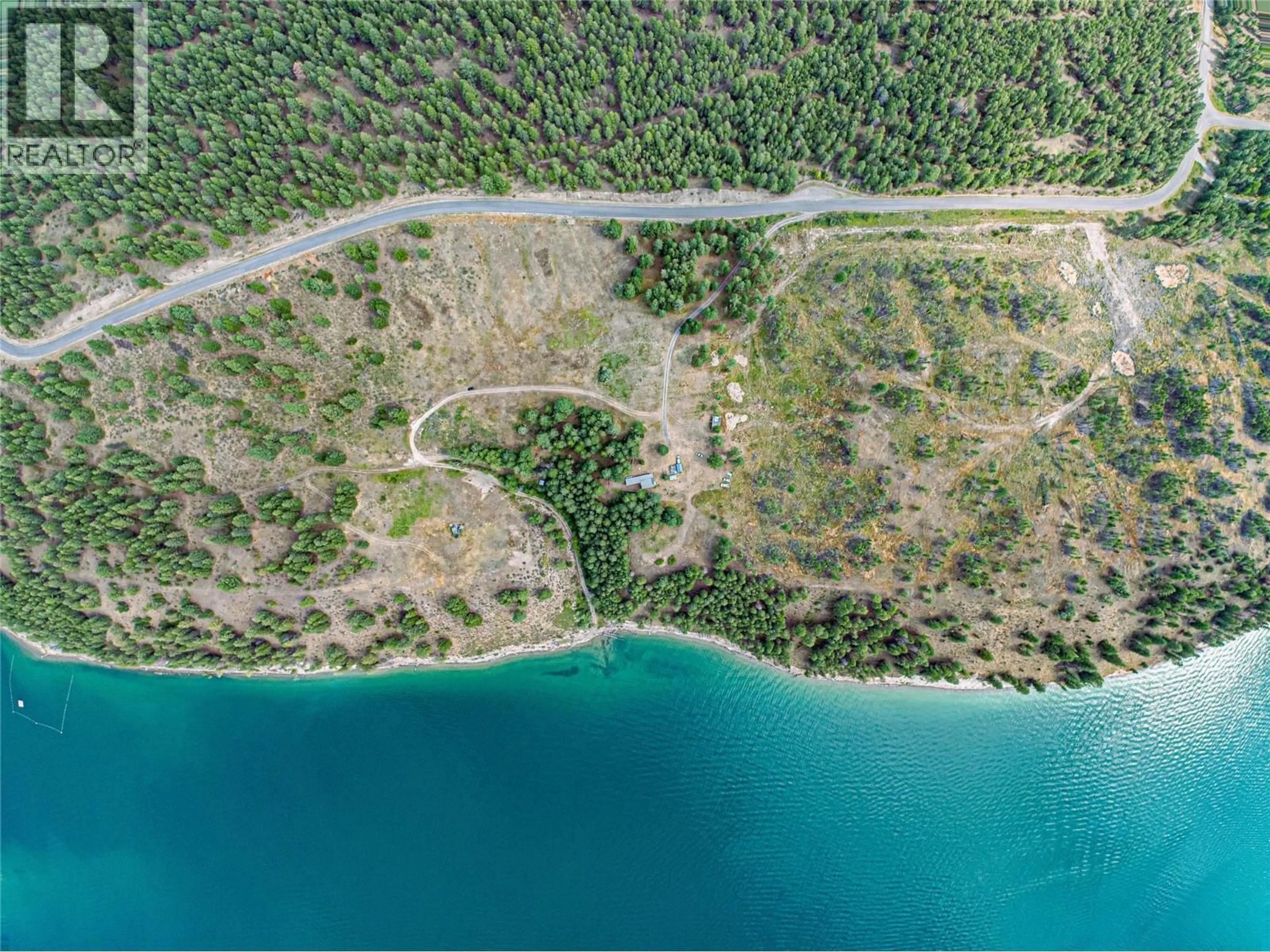 A pic from outside/outdoor area/front of a property/back of a property/a pic from drone, water/lake/river/ocean view for 1347 WALDO ROAD, Baynes Lake British Columbia V0B1T4