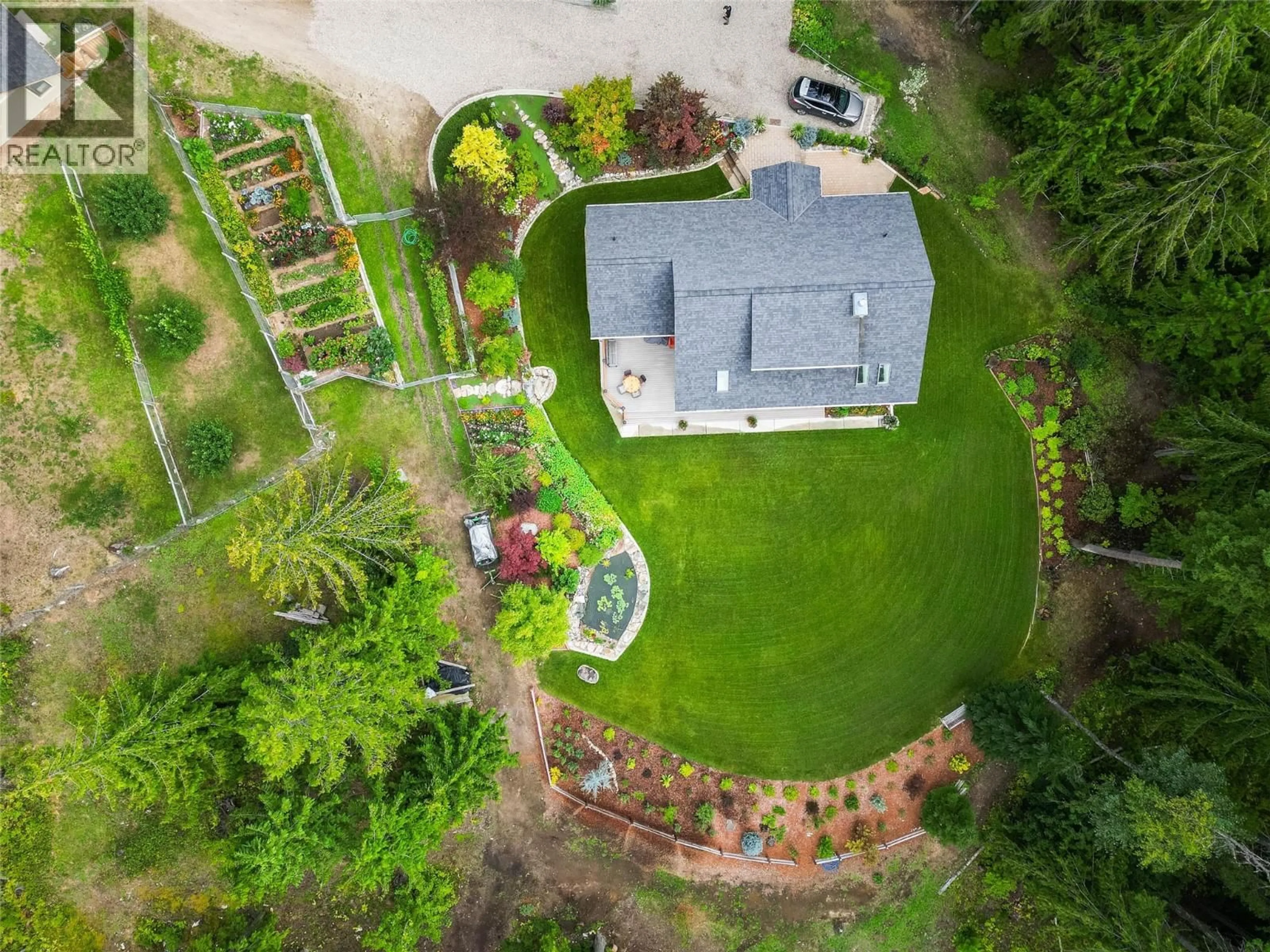 A pic from outside/outdoor area/front of a property/back of a property/a pic from drone, unknown for 6968 BEGGS ROAD, Nelson British Columbia V1L6S5