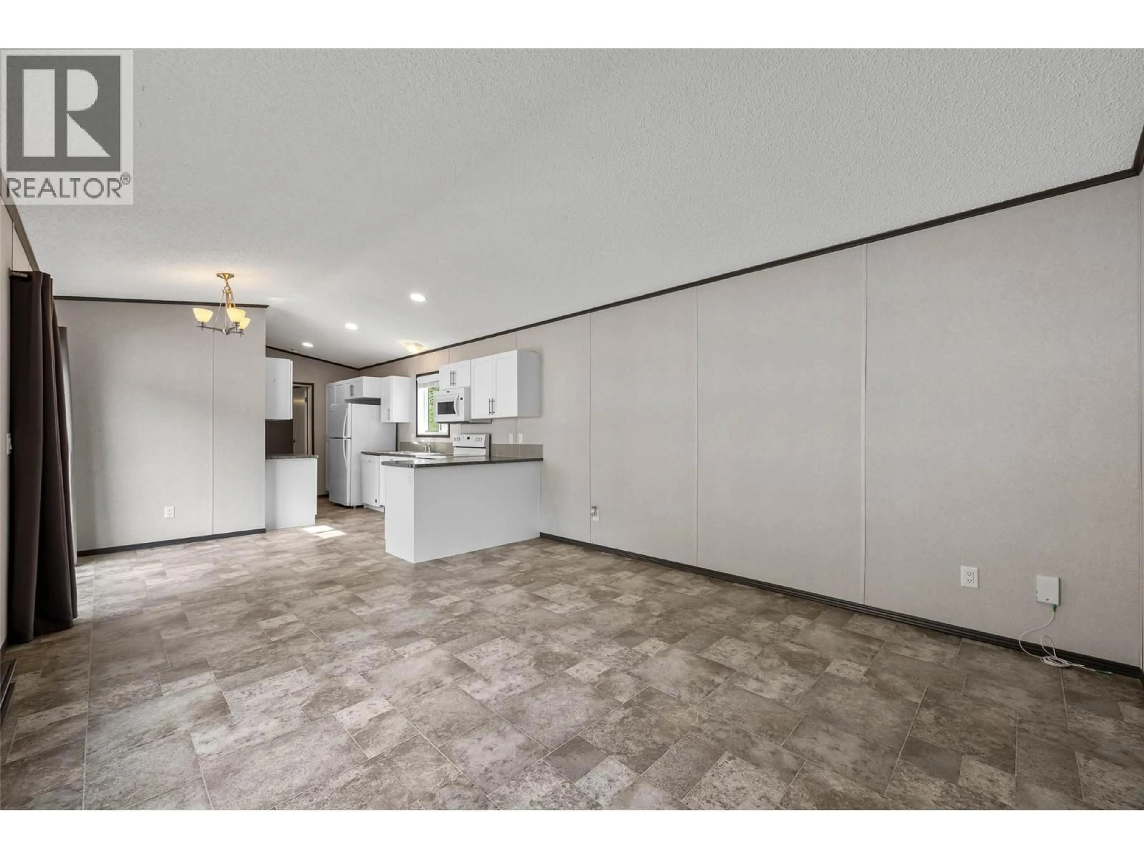 Open concept kitchen, ceramic/tile floor for 11 - 4428 BARRIERE TOWN ROAD, Barriere British Columbia V0E1E0