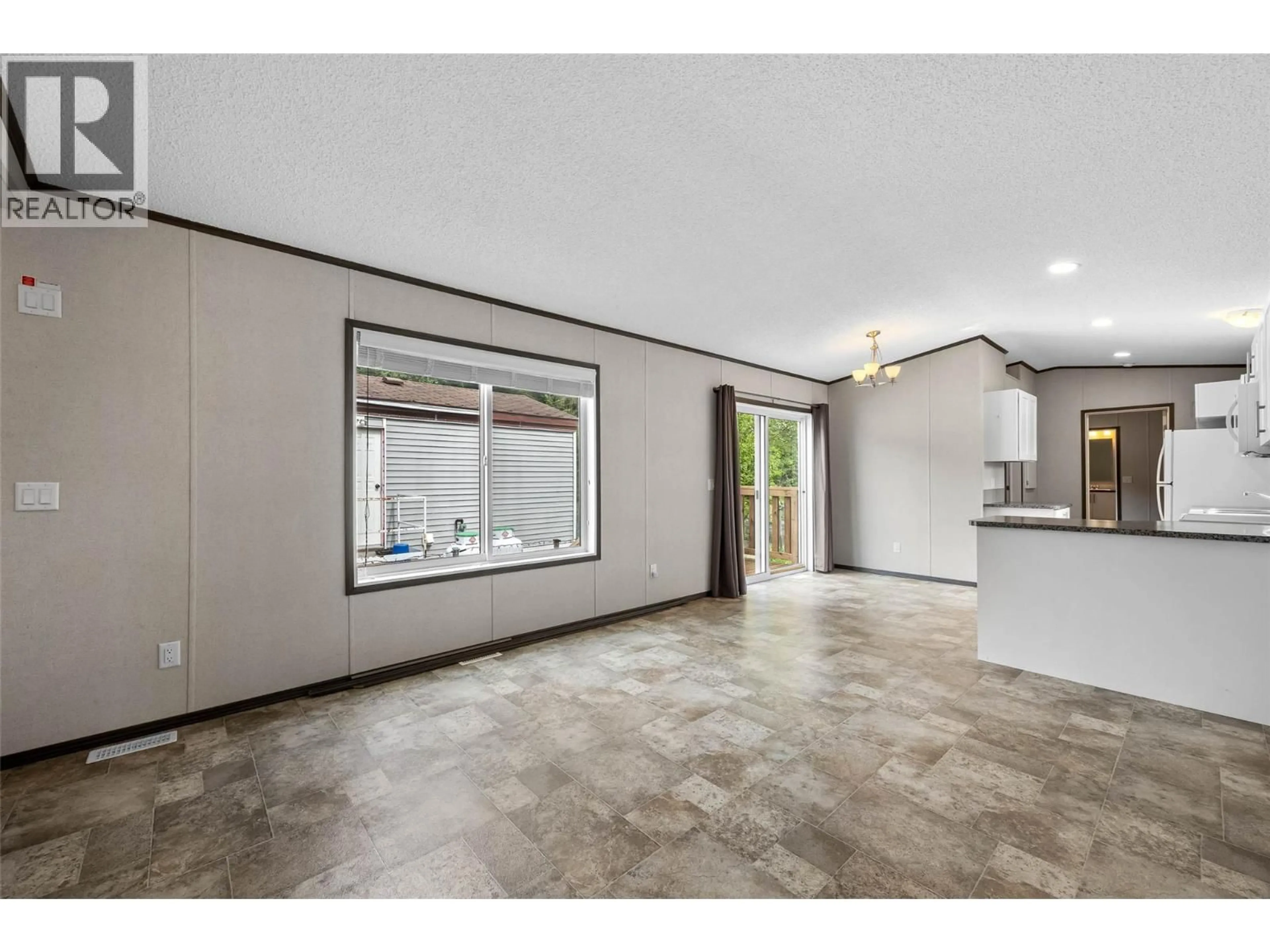 Open concept kitchen, ceramic/tile floor for 11 - 4428 BARRIERE TOWN ROAD, Barriere British Columbia V0E1E0