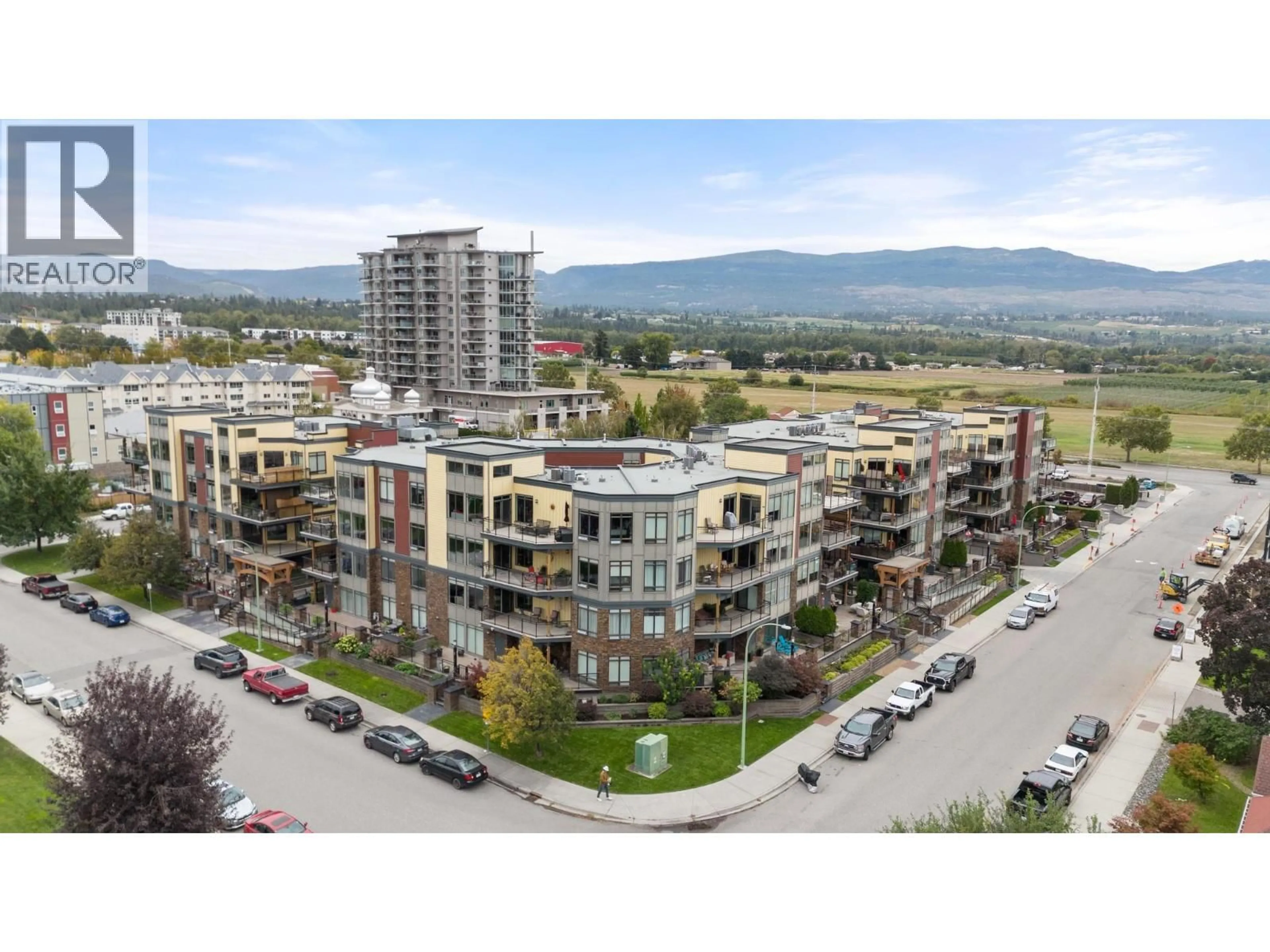 A pic from outside/outdoor area/front of a property/back of a property/a pic from drone, mountain view for 205 - 2011 AGASSIZ ROAD, Kelowna British Columbia V1Y9Z8