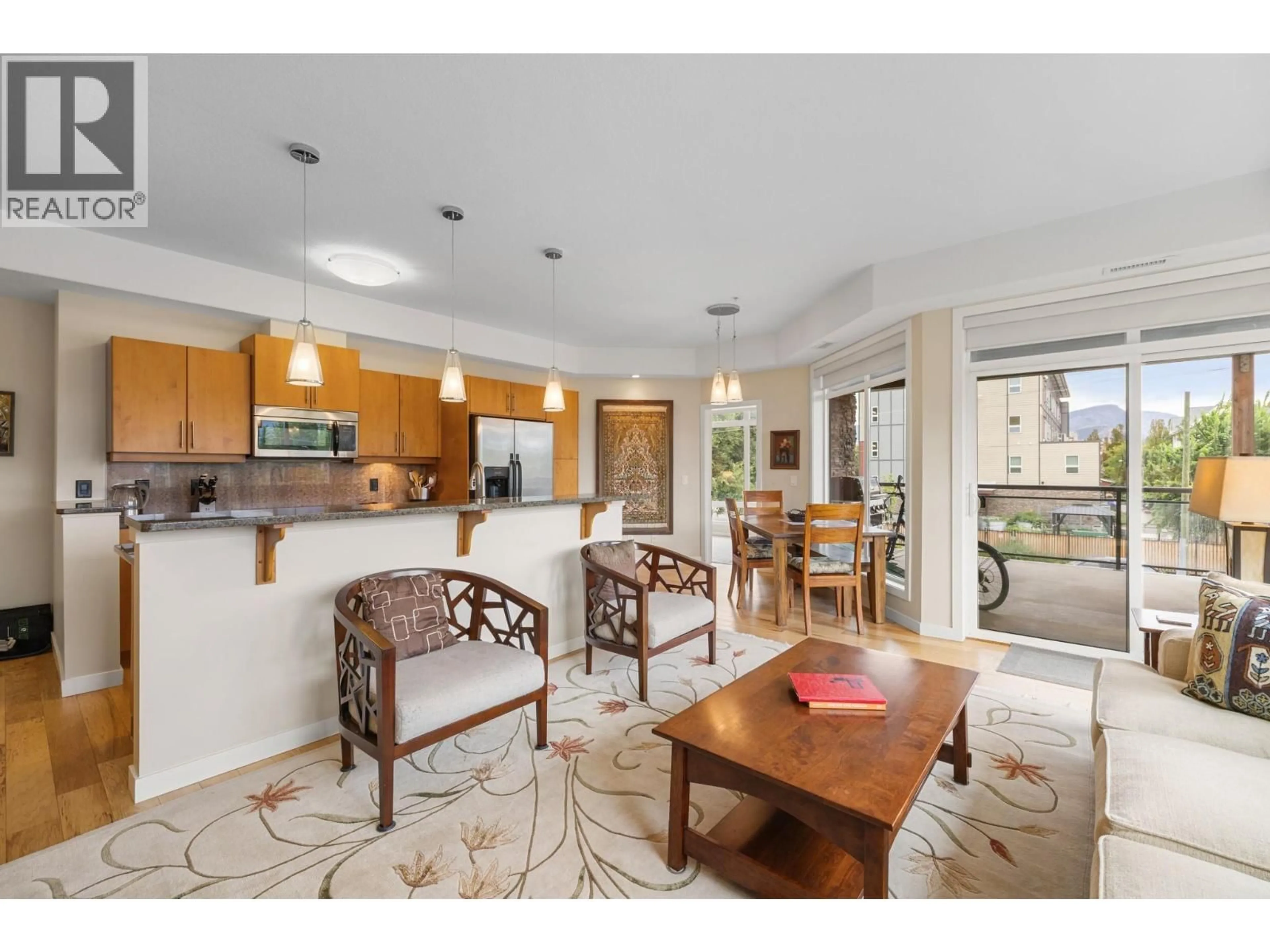 Open concept kitchen, ceramic/tile floor for 205 - 2011 AGASSIZ ROAD, Kelowna British Columbia V1Y9Z8