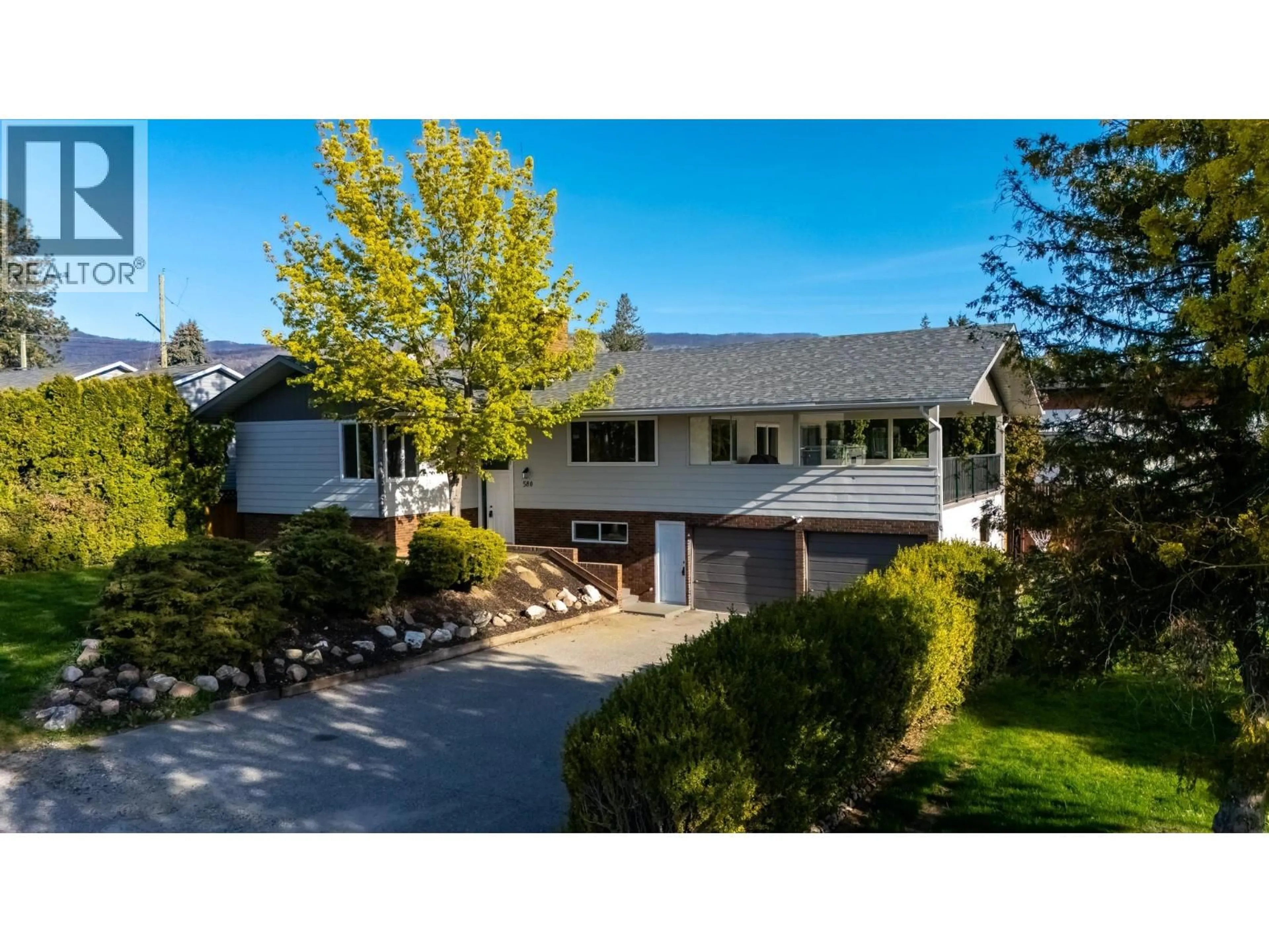A pic from outside/outdoor area/front of a property/back of a property/a pic from drone, street for 580 KELVIEW ROAD, West Kelowna British Columbia V1Z1E3
