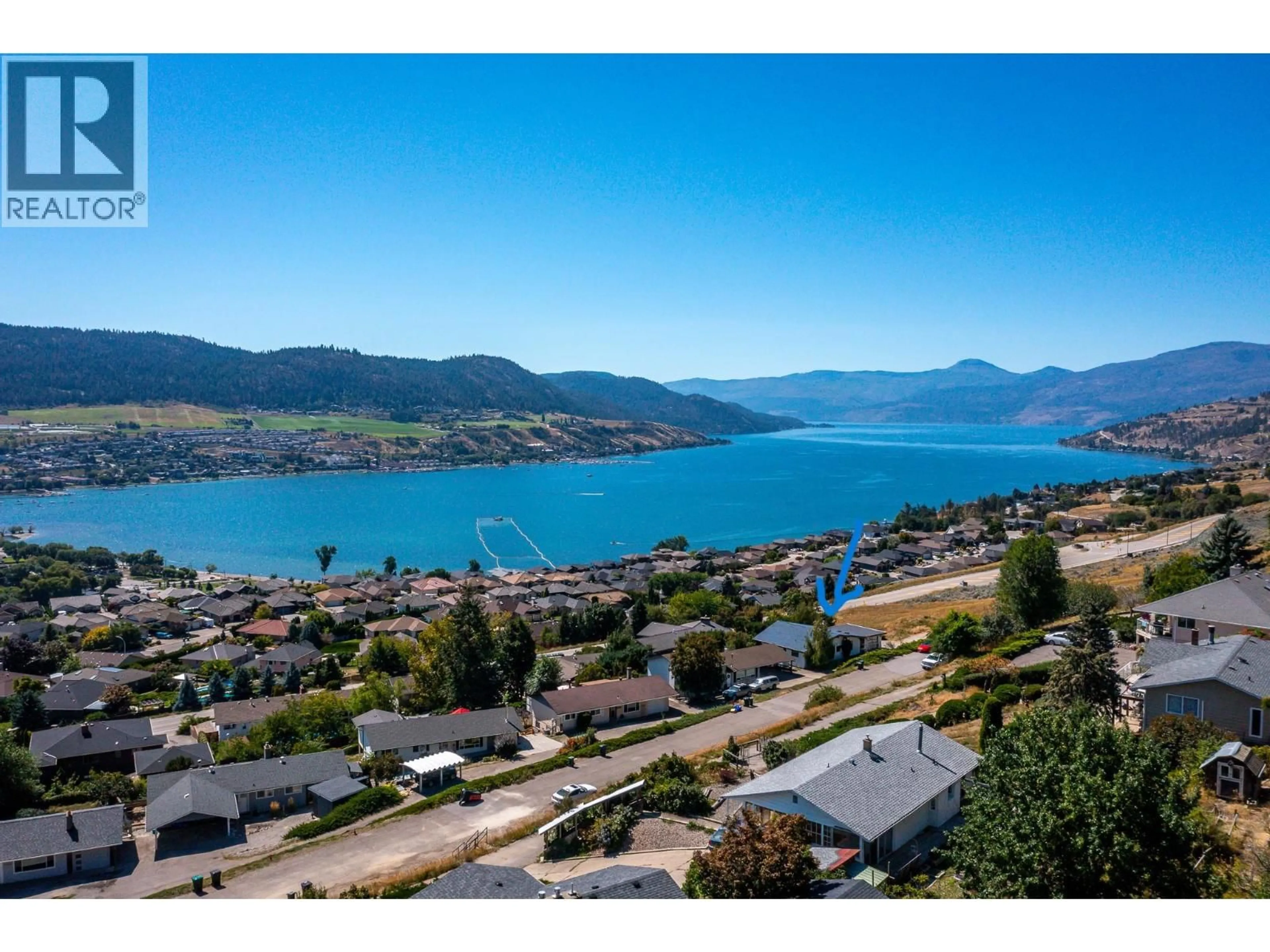 A pic from outside/outdoor area/front of a property/back of a property/a pic from drone, water/lake/river/ocean view for 7096 APPALOOSA WAY, Vernon British Columbia V1H1B9