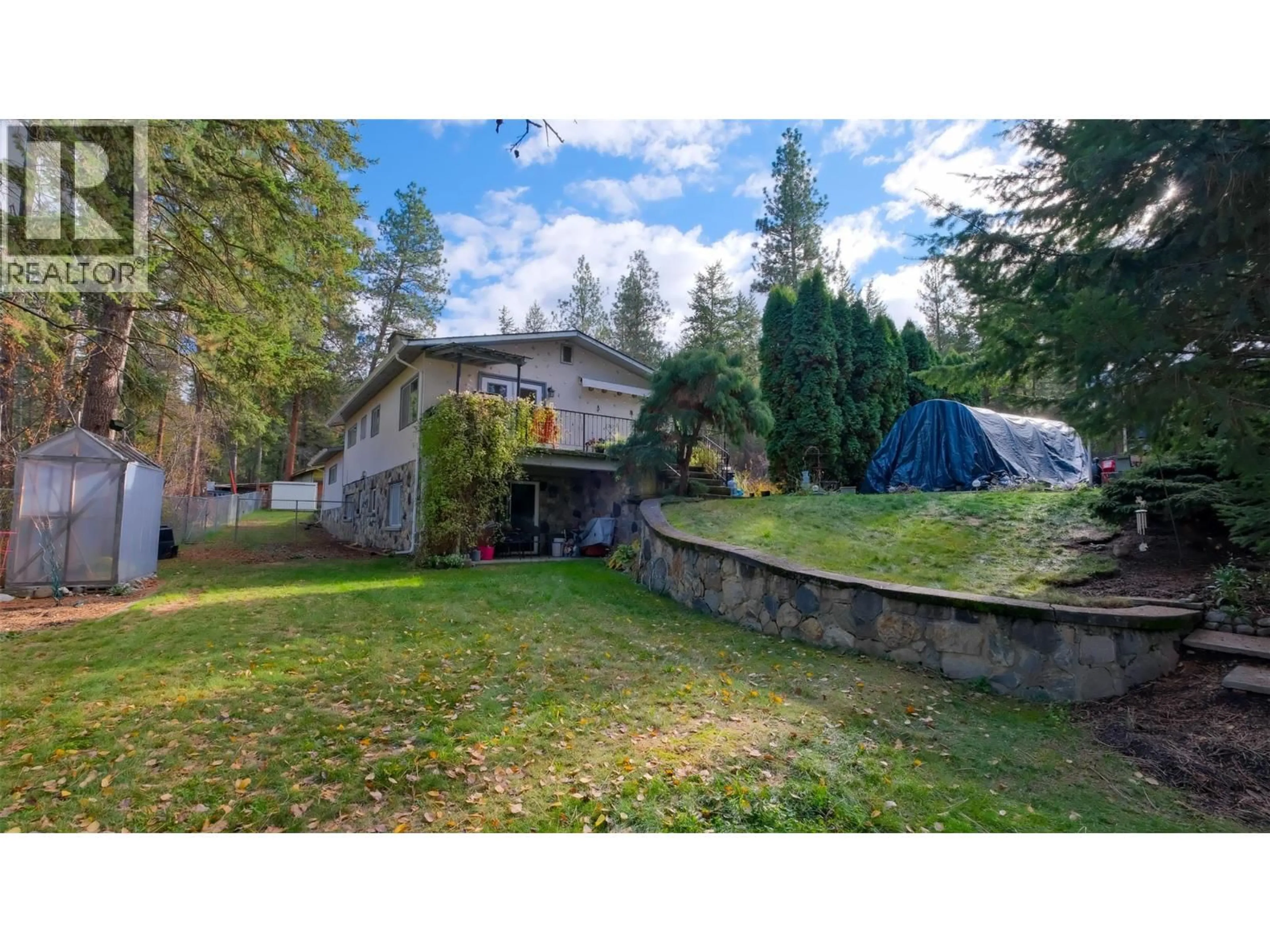 A pic from outside/outdoor area/front of a property/back of a property/a pic from drone, unknown for 4099 MILLER ROAD, Kelowna British Columbia V1W4C7