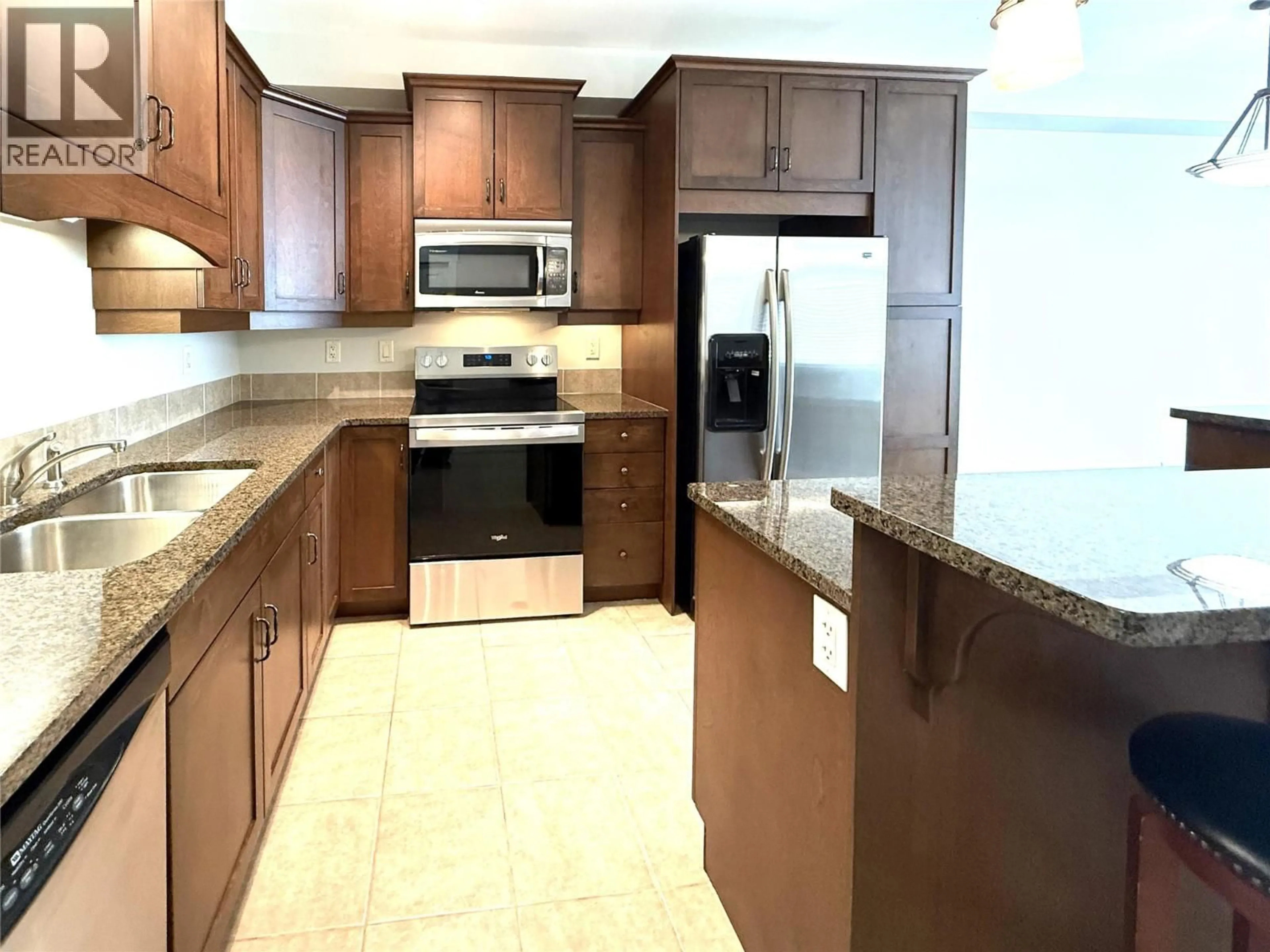 Standard kitchen, ceramic/tile floor for 203 - 795 MCGILL ROAD, Kamloops British Columbia V2C0B9
