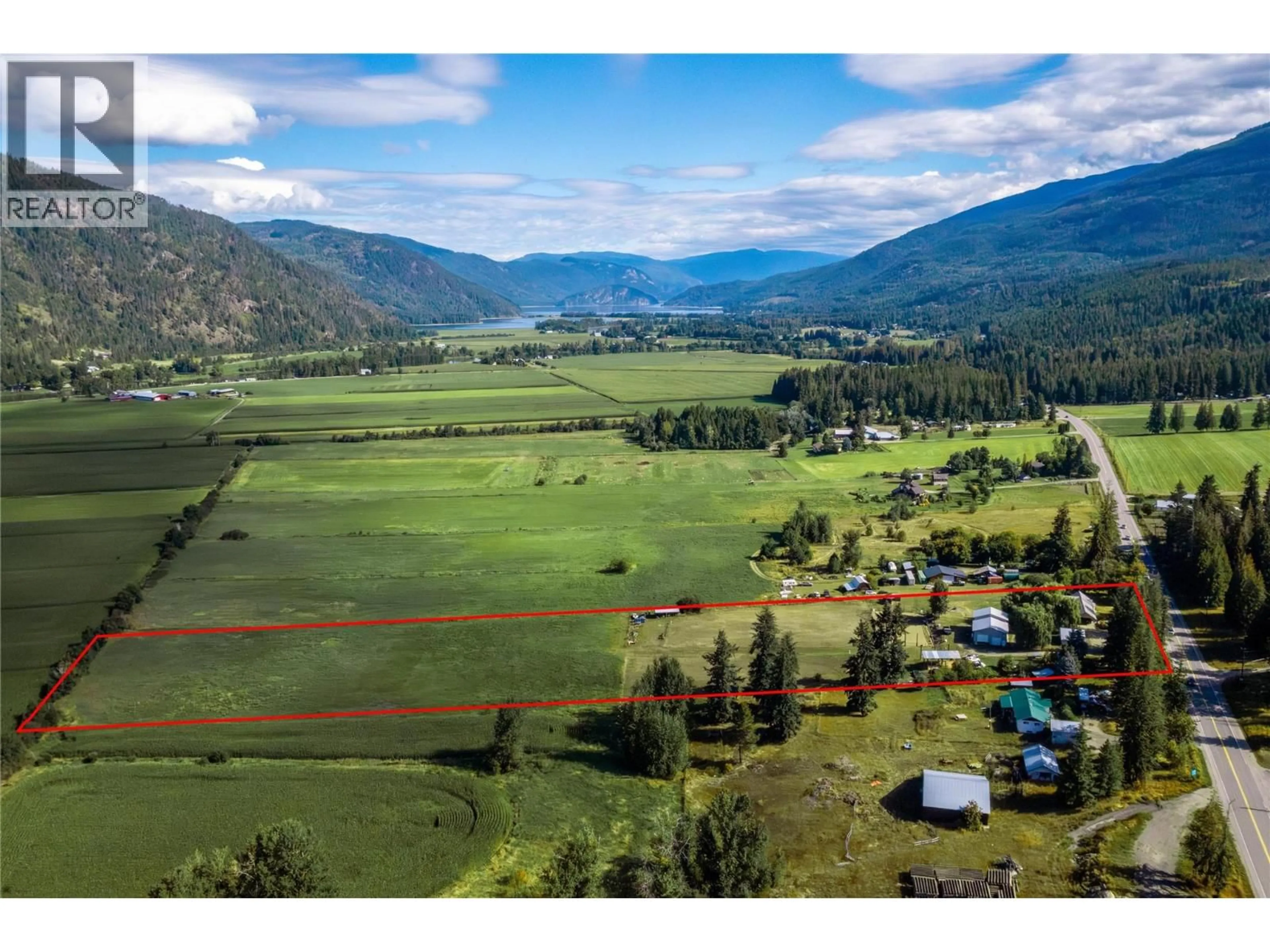 A pic from outside/outdoor area/front of a property/back of a property/a pic from drone, mountain view for 7630 97A HIGHWAY, Mara British Columbia V0E2K0