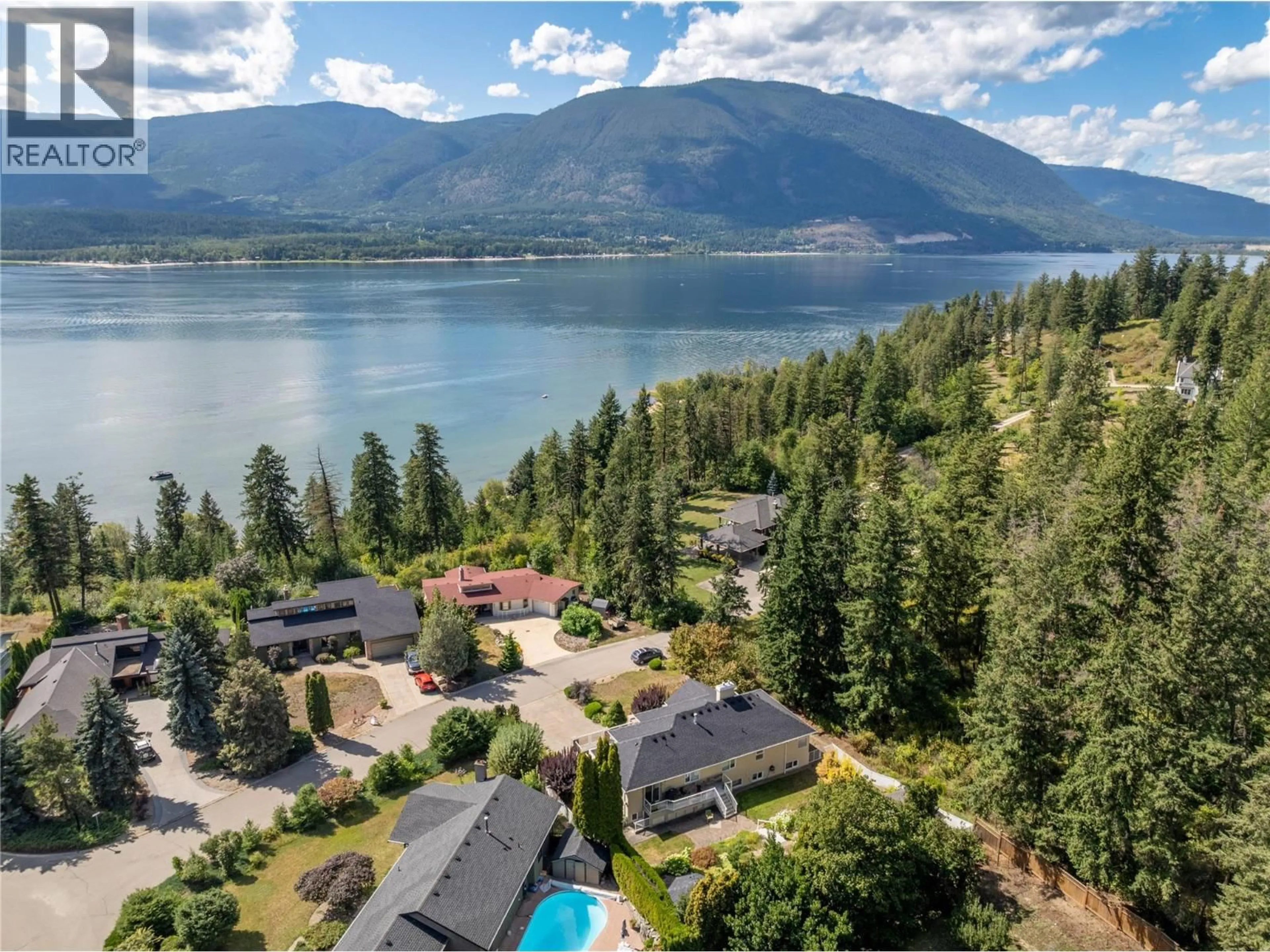 A pic from outside/outdoor area/front of a property/back of a property/a pic from drone, water/lake/river/ocean view for 5231 11 STREET NORTHEAST, Salmon Arm British Columbia V1E3N3