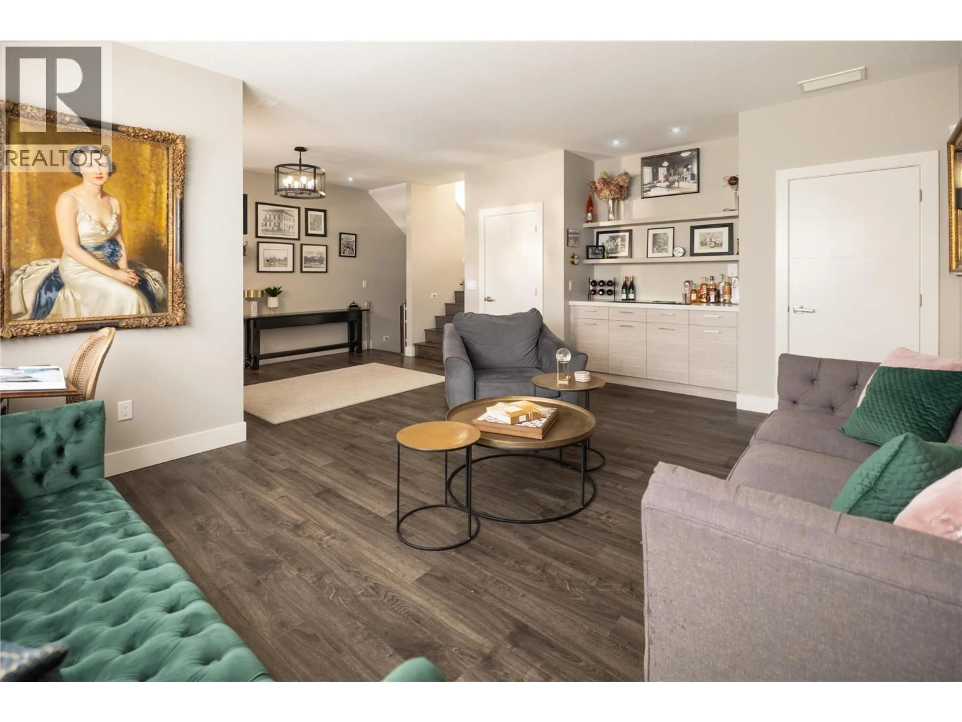 Living room with furniture, wood/laminate floor for 351 HILLSIDE AVENUE, Kelowna British Columbia V1W5H1