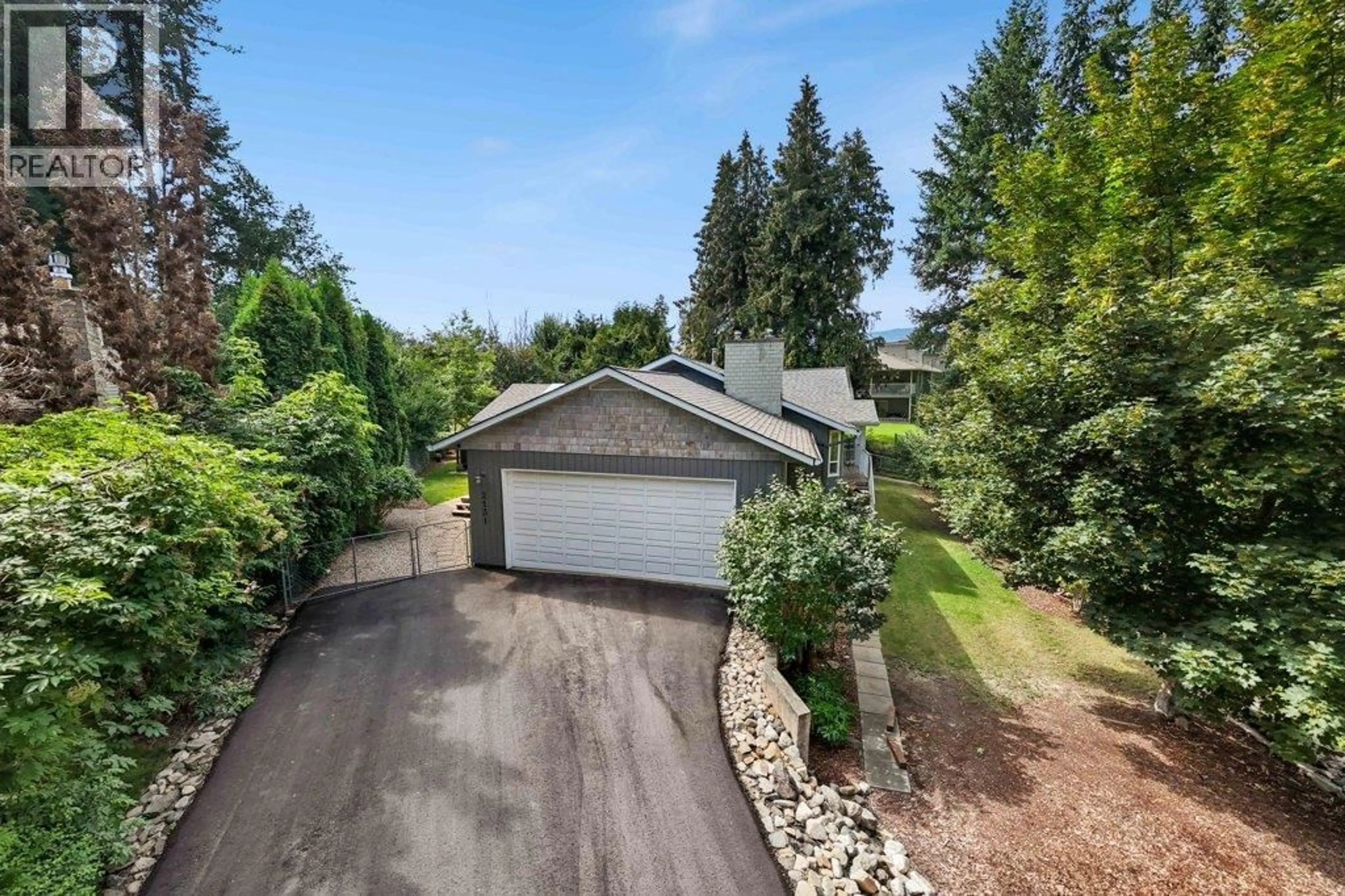 A pic from outside/outdoor area/front of a property/back of a property/a pic from drone, unknown for 2131 21 STREET NORTHEAST, Salmon Arm British Columbia V1E3E4