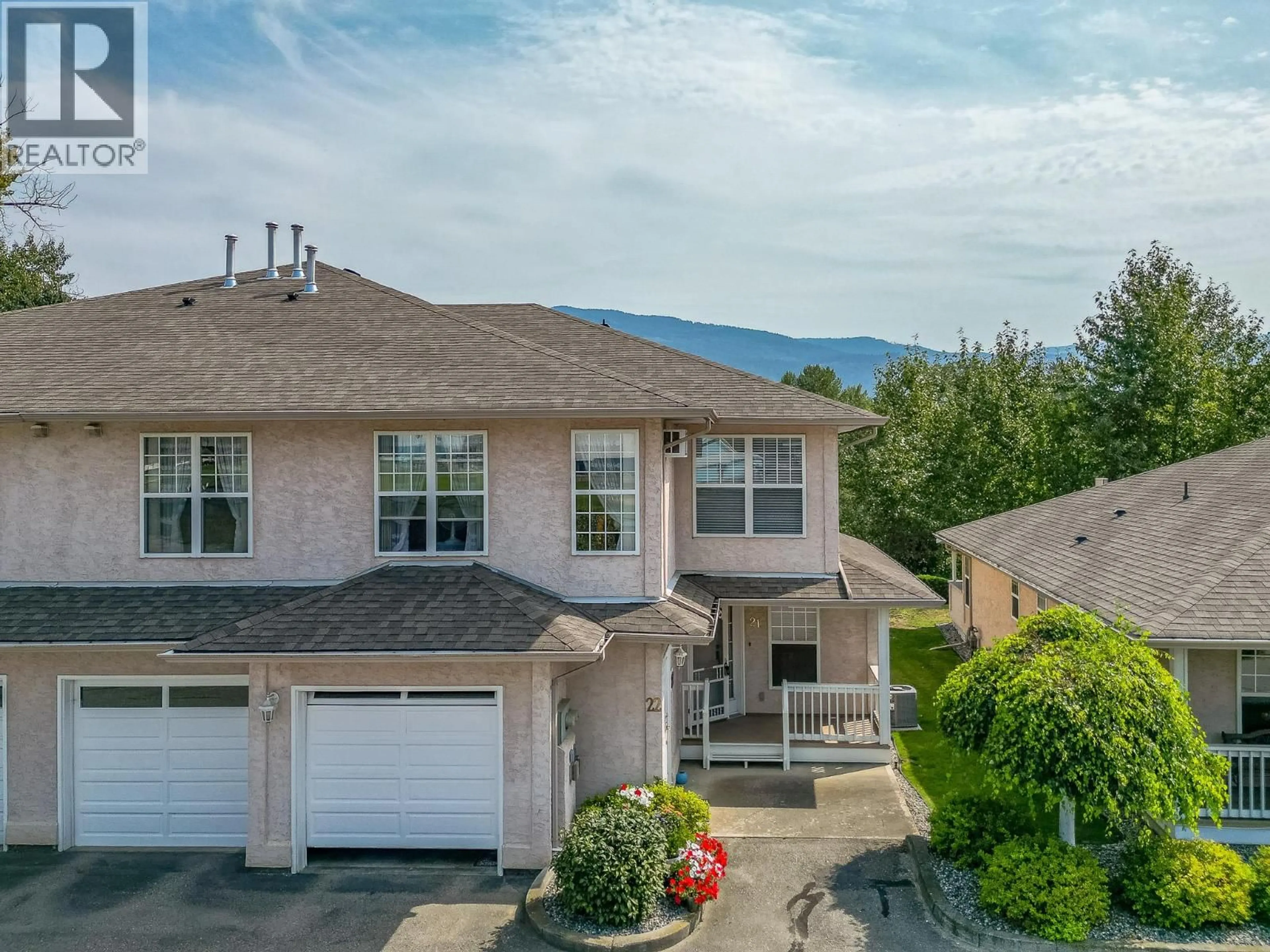 A pic from outside/outdoor area/front of a property/back of a property/a pic from drone, mountain view for 21 - 303 REGENT AVENUE, Enderby British Columbia V0E1V2