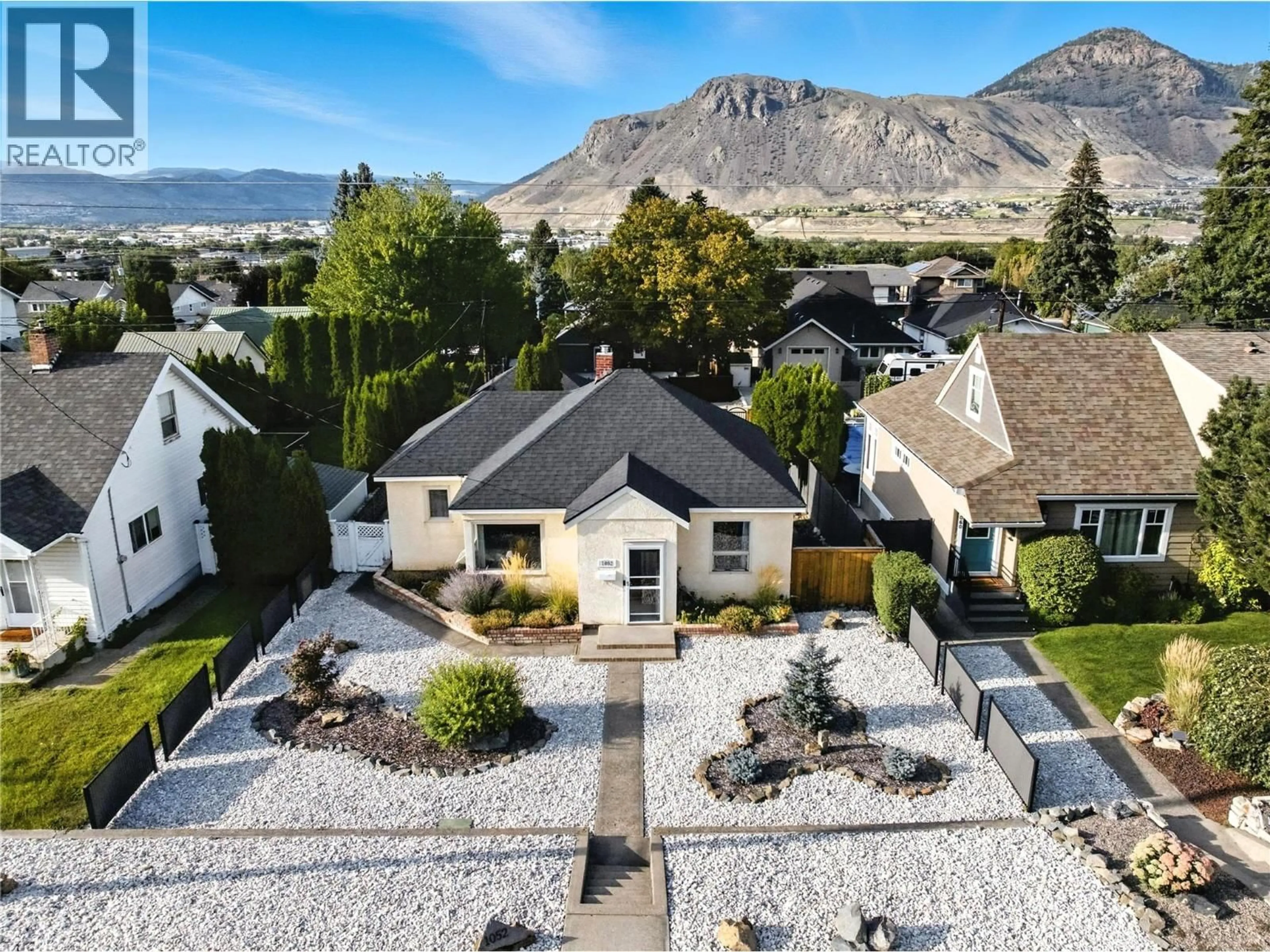 A pic from outside/outdoor area/front of a property/back of a property/a pic from drone, mountain view for 1052 PLEASANT STREET, Kamloops British Columbia V2C3B8