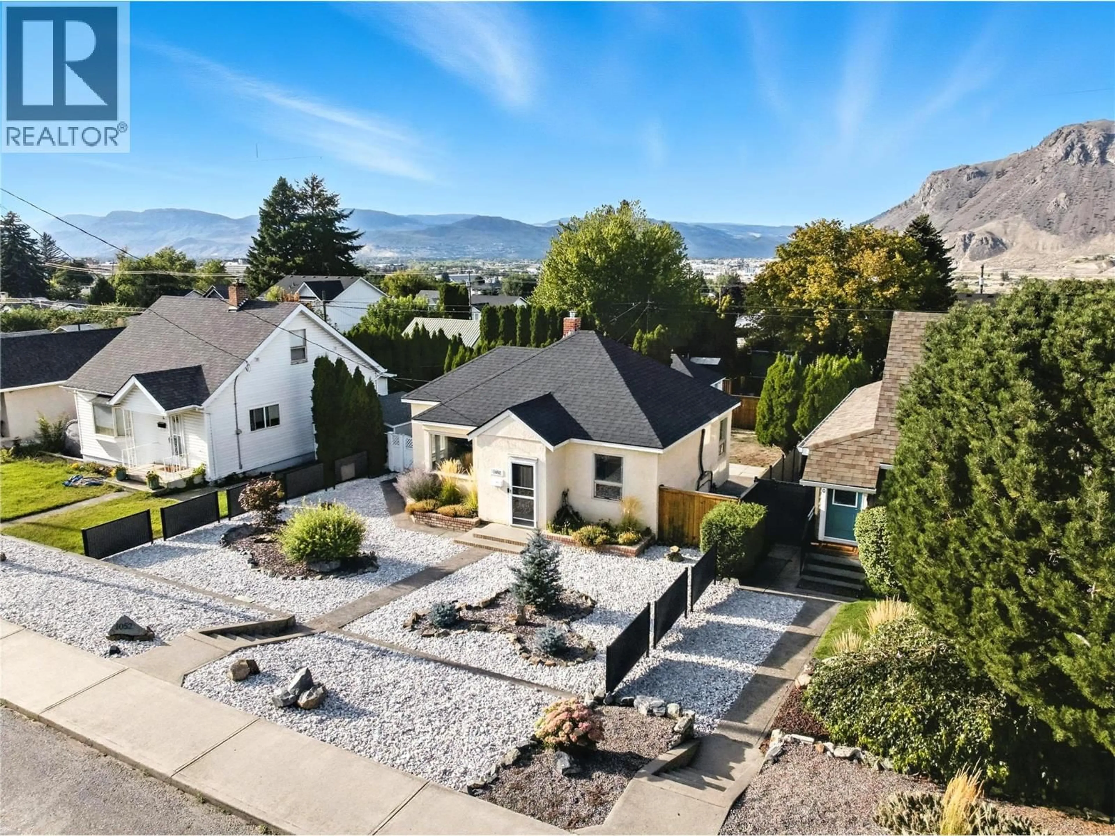 A pic from outside/outdoor area/front of a property/back of a property/a pic from drone, mountain view for 1052 PLEASANT STREET, Kamloops British Columbia V2C3B8