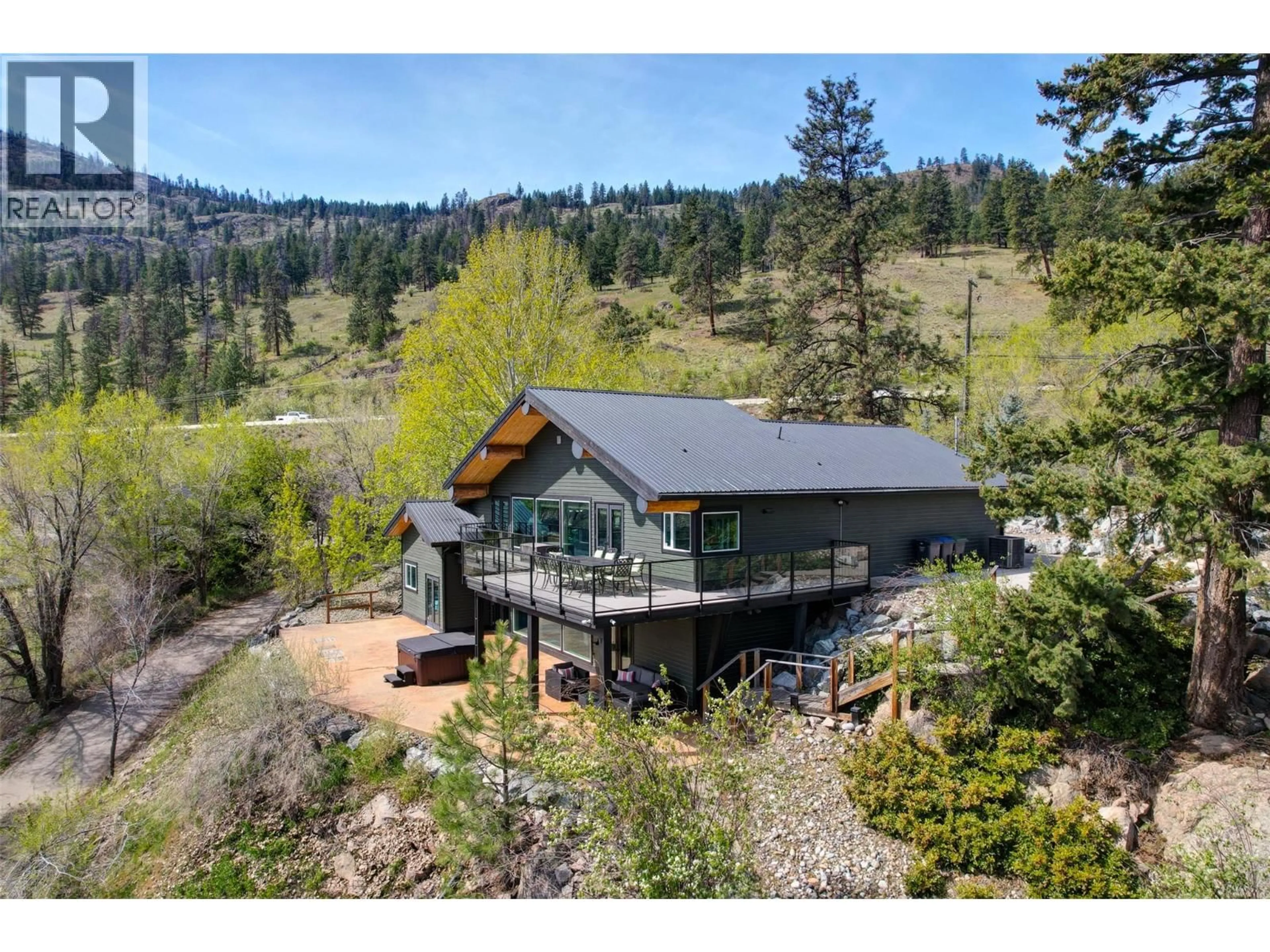 A pic from outside/outdoor area/front of a property/back of a property/a pic from drone, unknown for 7172 BRENT ROAD, Peachland British Columbia V0H1X9