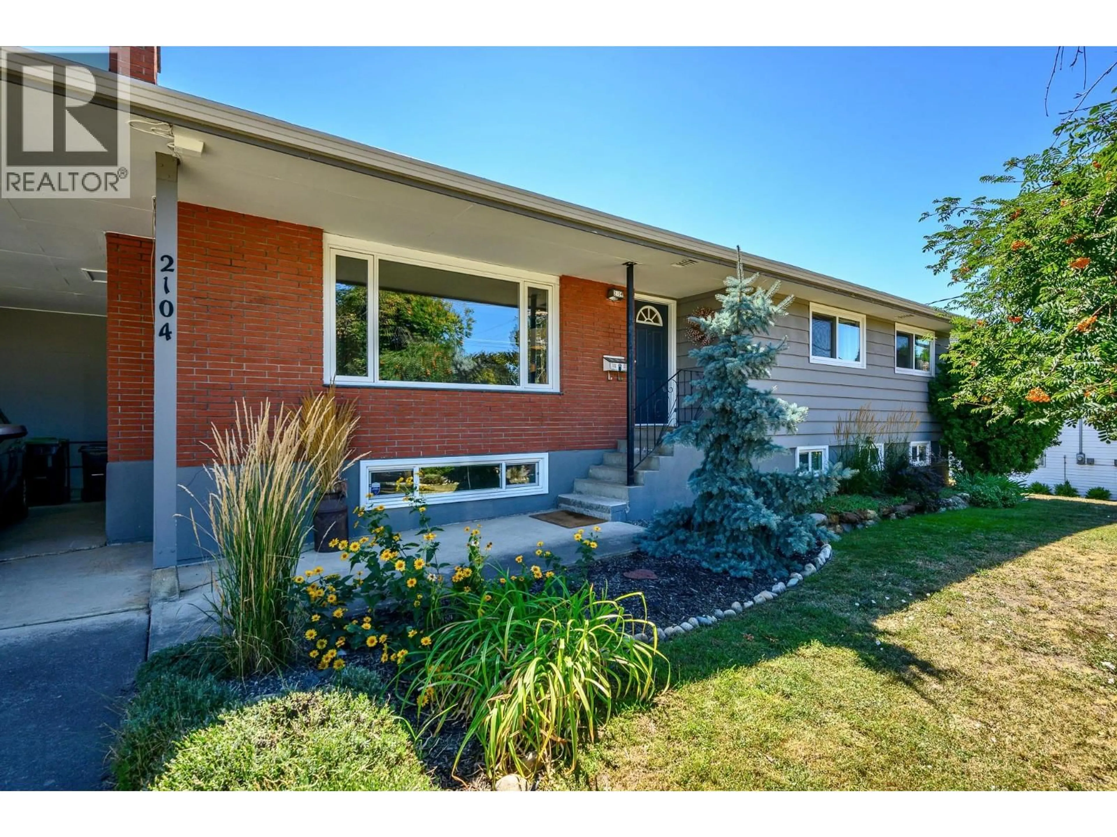 Home with brick exterior material, street for 2104 25 AVENUE, Vernon British Columbia V1T1M9