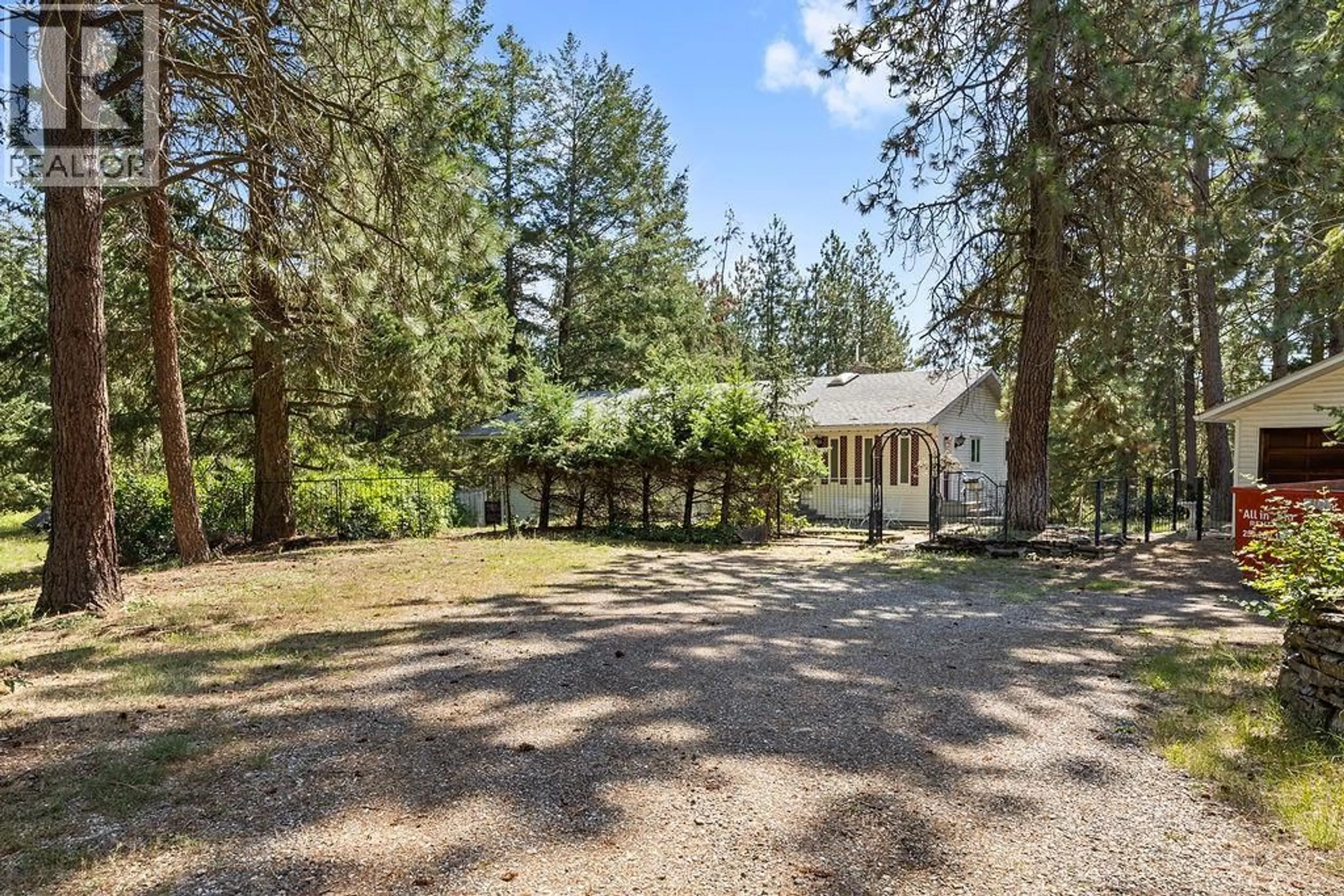 A pic from outside/outdoor area/front of a property/back of a property/a pic from drone, forest/trees view for 4340 SHARP ROAD, Armstrong British Columbia V4Y0V6
