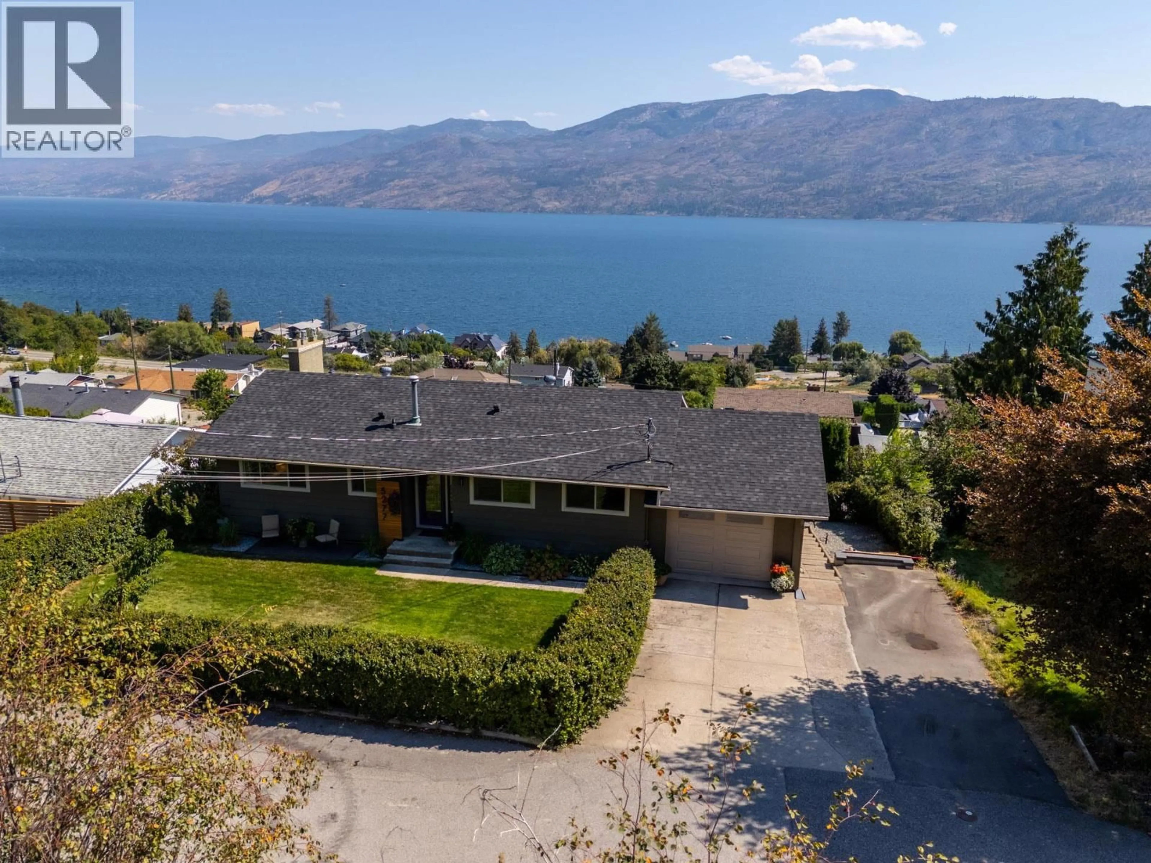 A pic from outside/outdoor area/front of a property/back of a property/a pic from drone, water/lake/river/ocean view for 5277 CLARENCE ROAD, Peachland British Columbia V0H1X2