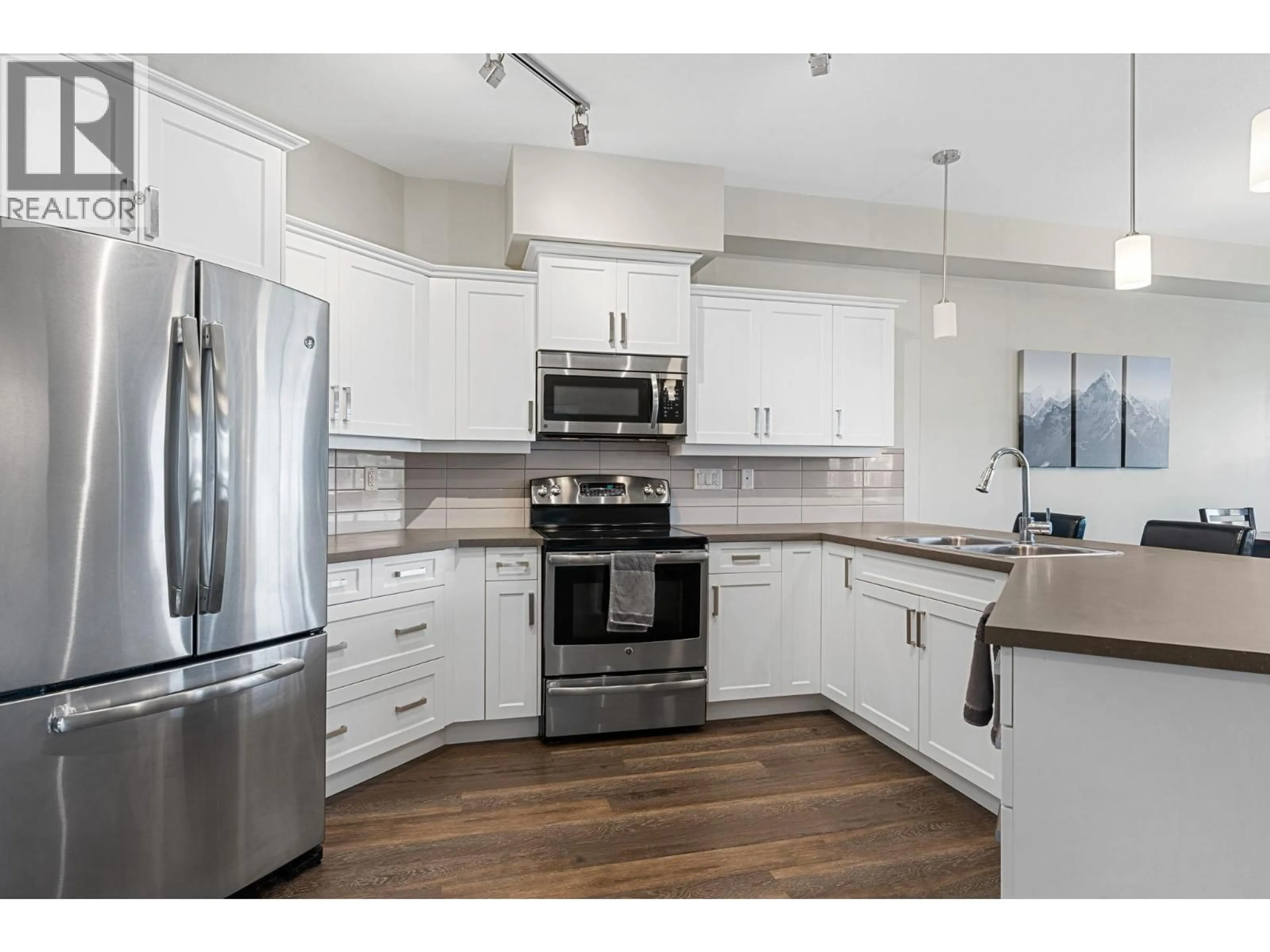 Open concept kitchen, unknown for 209 - 3731 CASORSO ROAD, Kelowna British Columbia V1W5E9