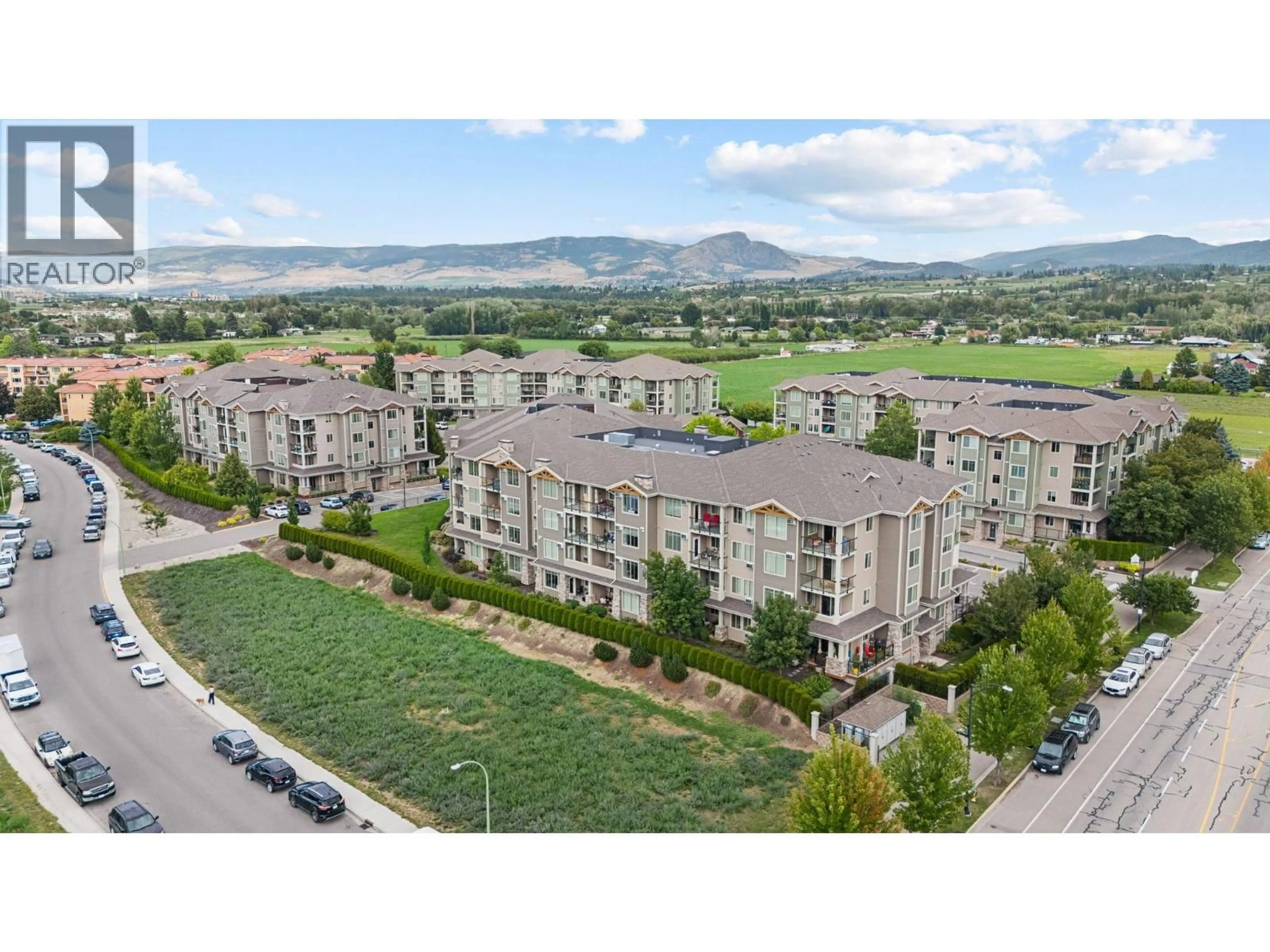 A pic from outside/outdoor area/front of a property/back of a property/a pic from drone, mountain view for 209 - 3731 CASORSO ROAD, Kelowna British Columbia V1W5E9