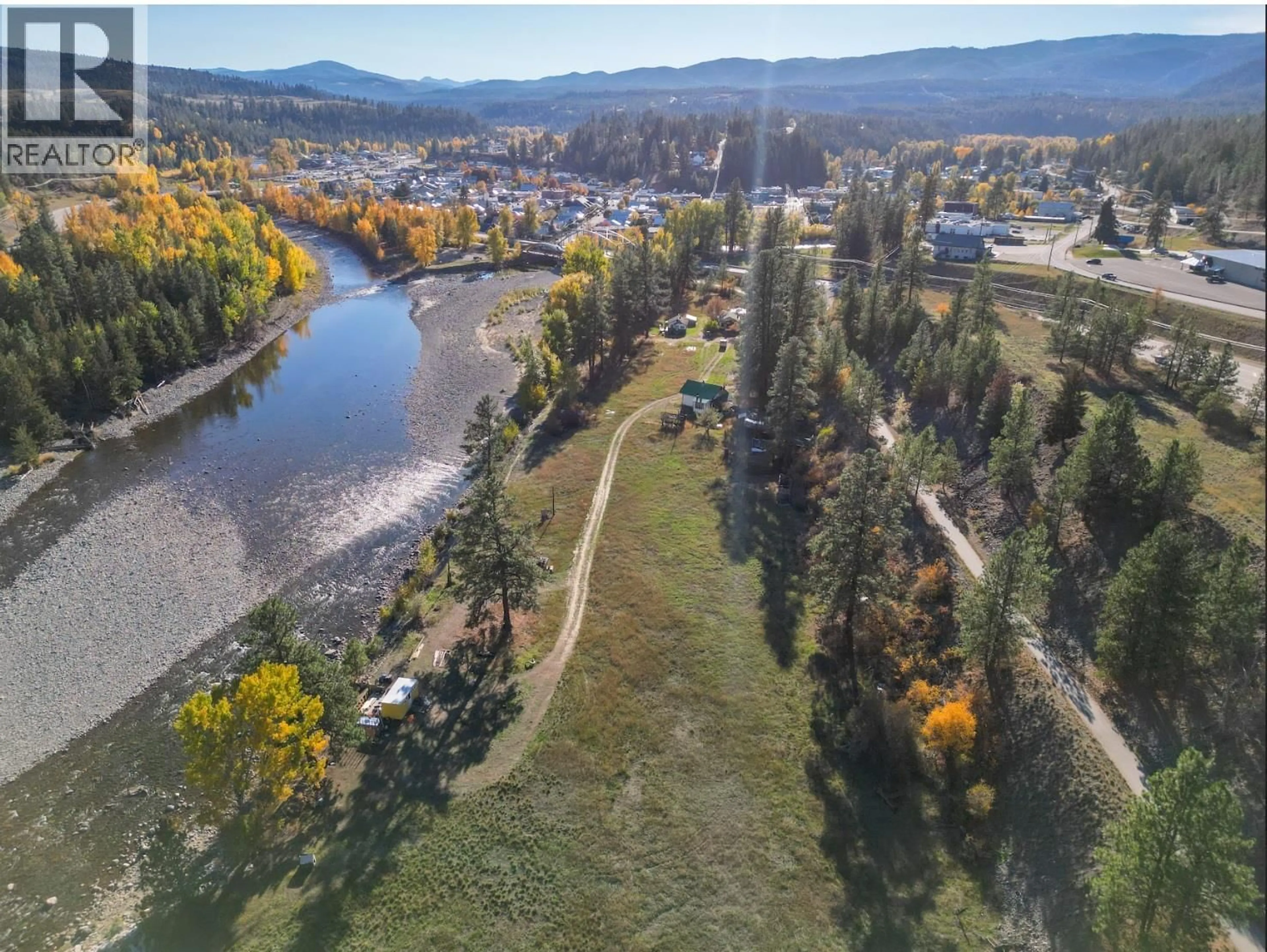 A pic from outside/outdoor area/front of a property/back of a property/a pic from drone, water/lake/river/ocean view for 202 A,B,C 5A HIGHWAY, Princeton British Columbia V0X1W0