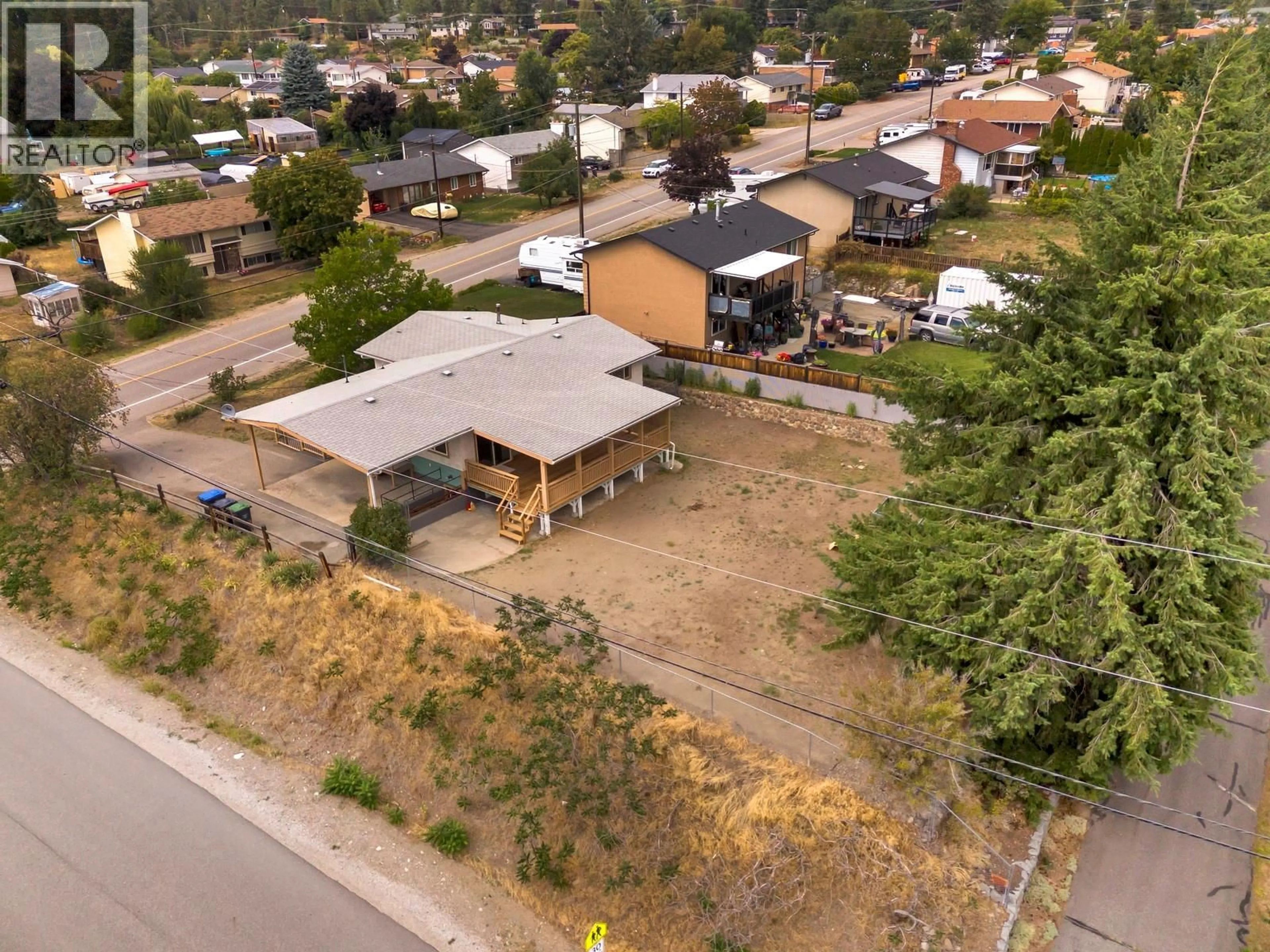 A pic from outside/outdoor area/front of a property/back of a property/a pic from drone, street for 3659 DUNBARTON ROAD, West Kelowna British Columbia V4T1J5