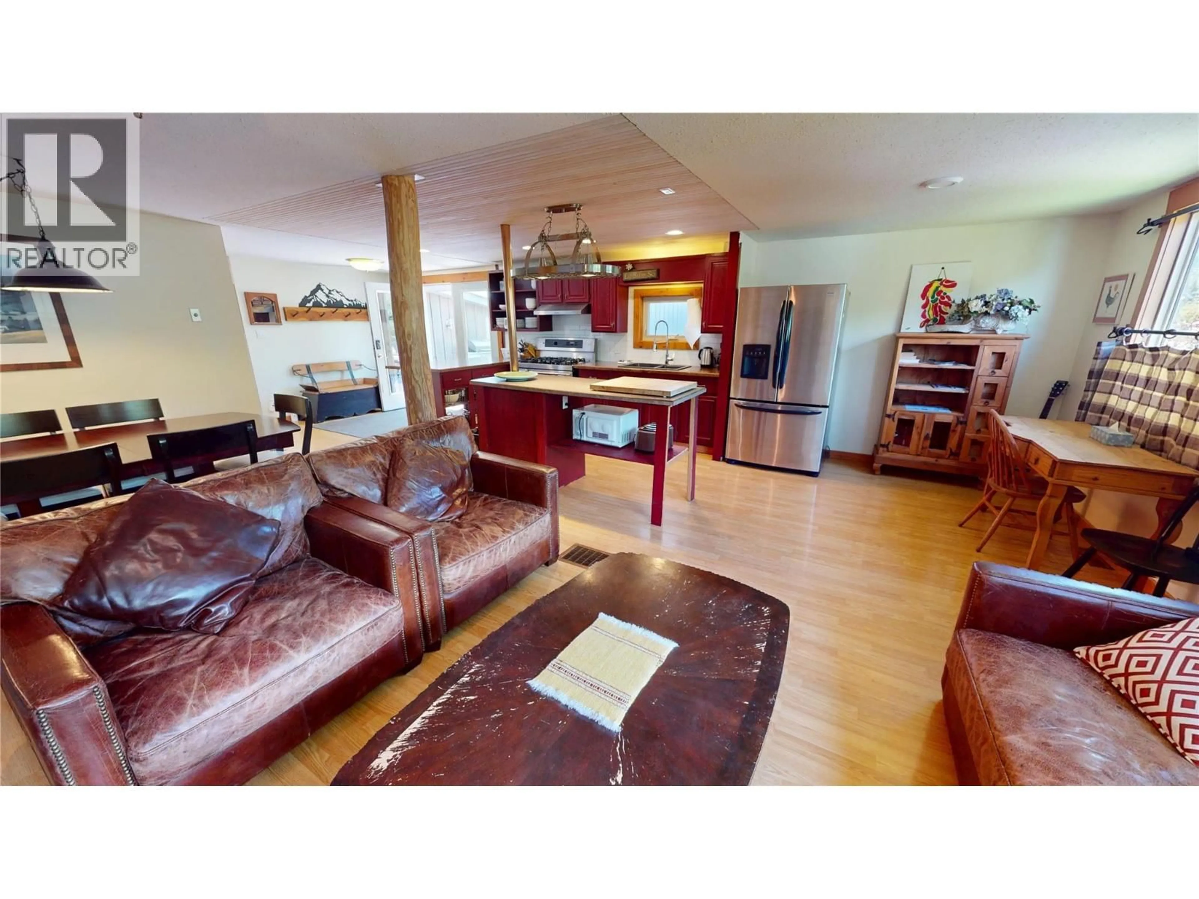 Living room with furniture, wood/laminate floor for 1142 10 AVENUE, Fernie British Columbia V0B1M0