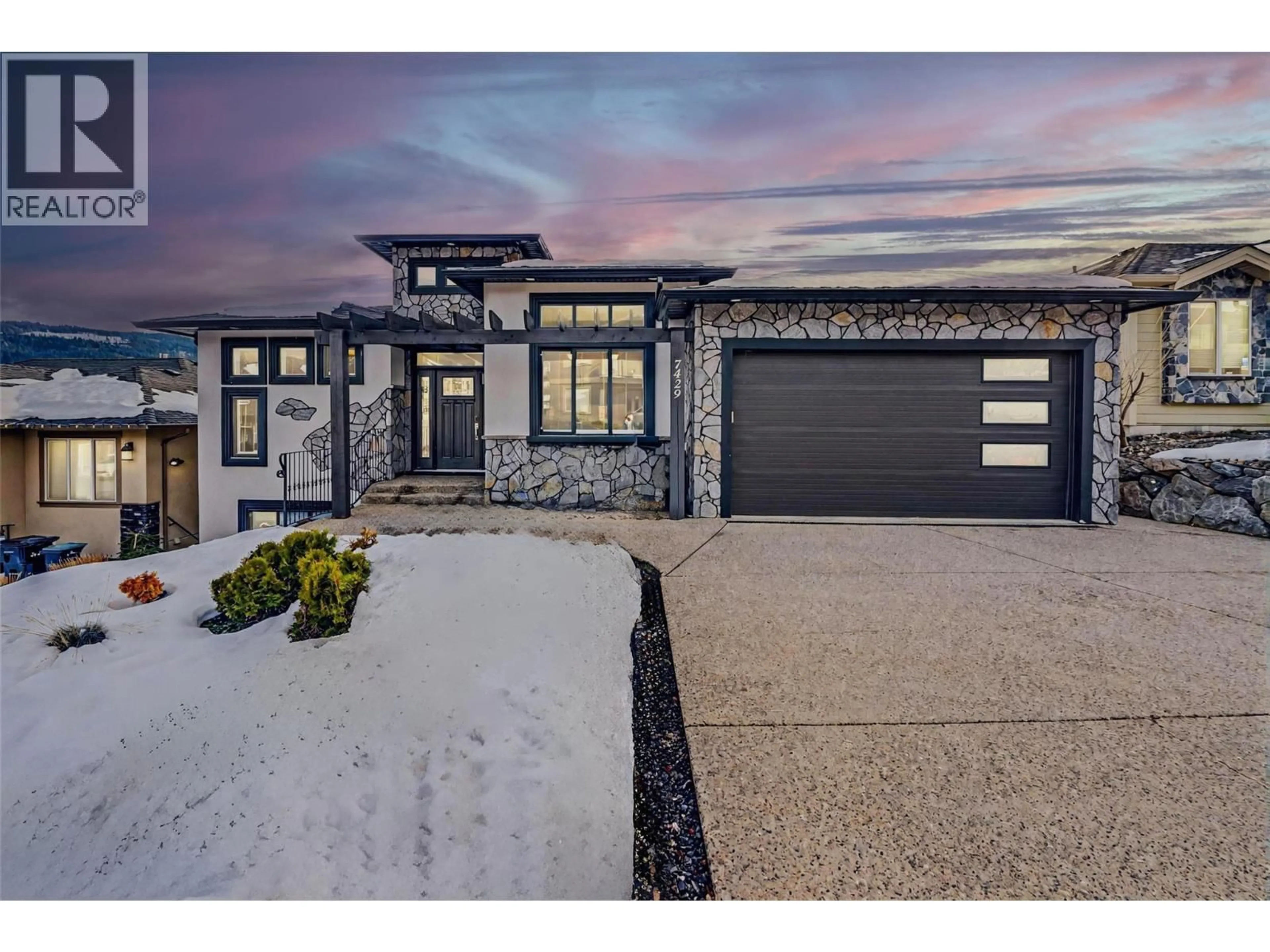 Home with brick exterior material, street for 7429 SUN PEAKS DRIVE, Vernon British Columbia V1B4C7