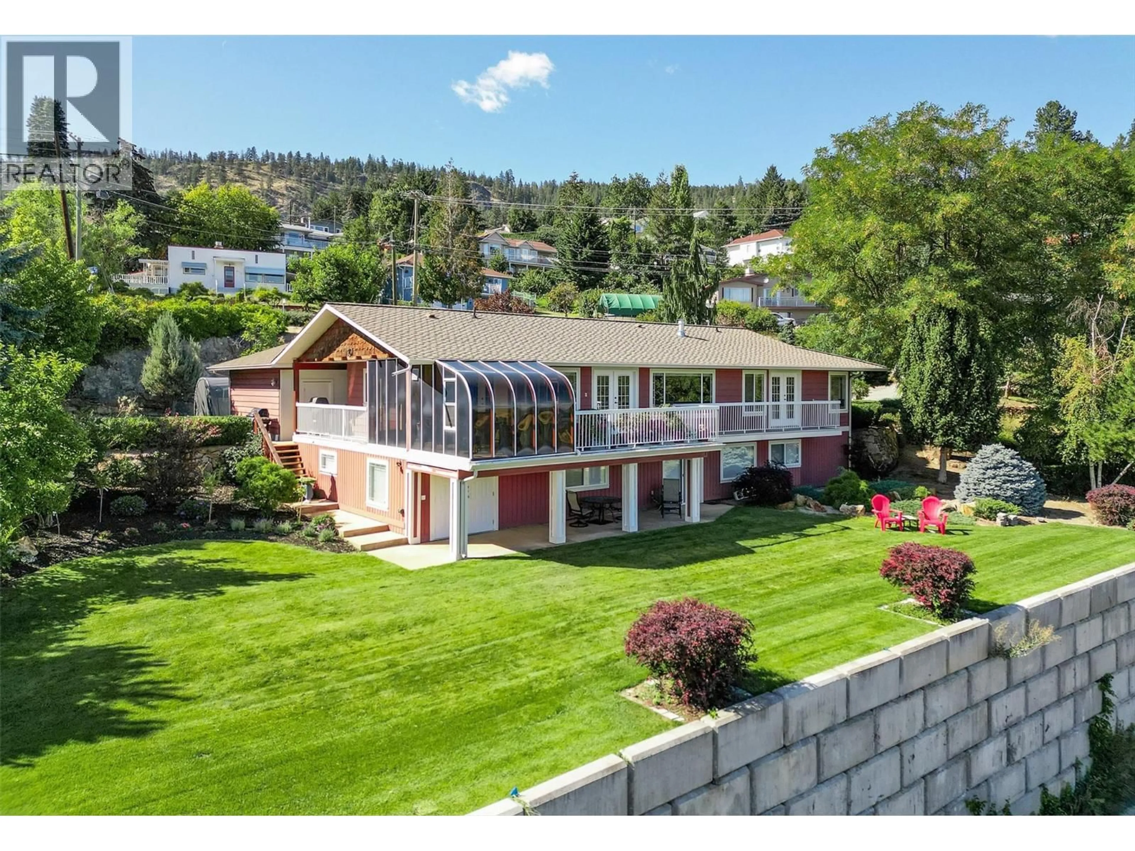 A pic from outside/outdoor area/front of a property/back of a property/a pic from drone, mountain view for 4649 PRINCETON AVENUE, Peachland British Columbia V0H1X7