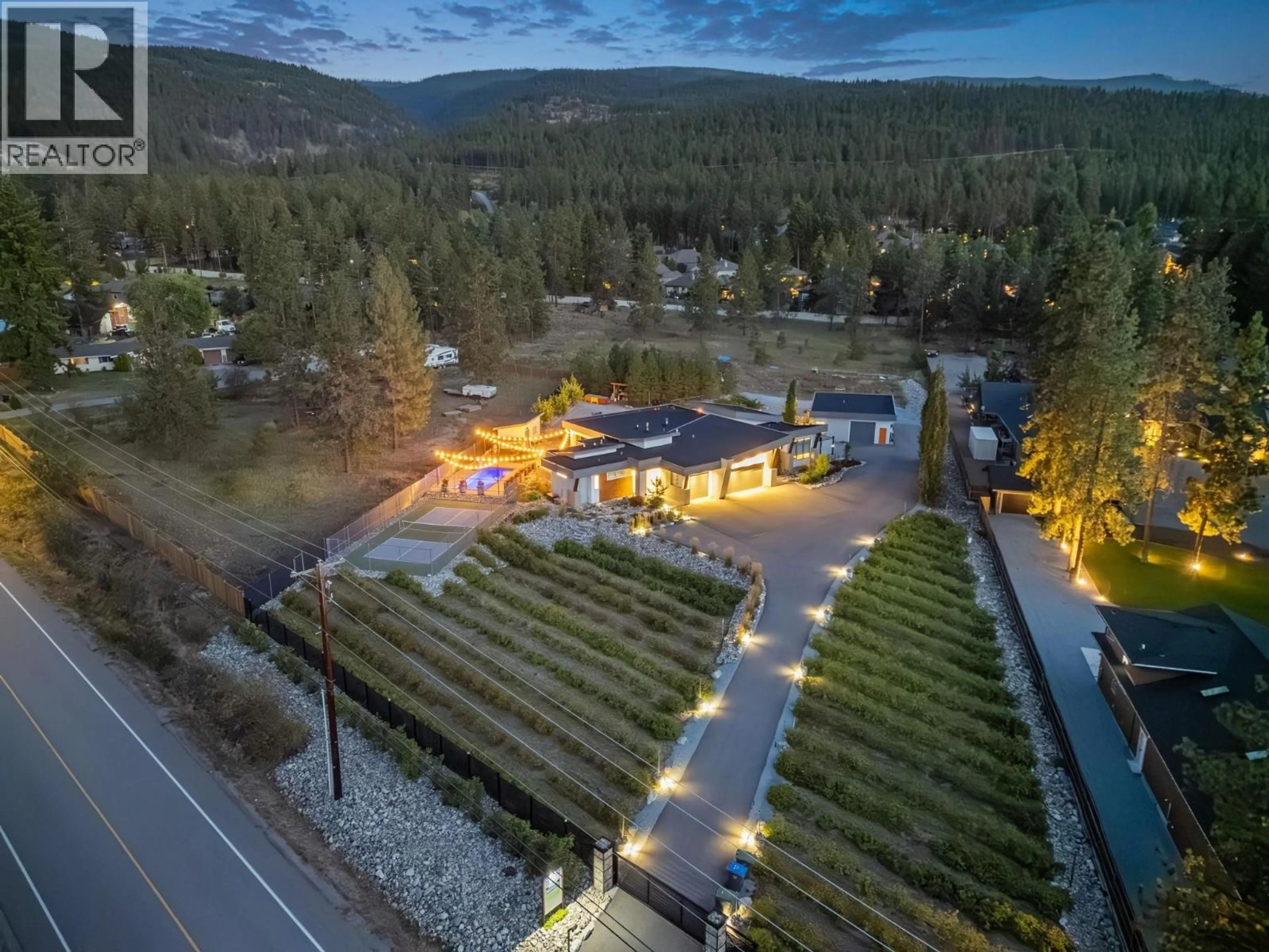 A pic from outside/outdoor area/front of a property/back of a property/a pic from drone, mountain view for 4535 MCCULLOCH ROAD, Kelowna British Columbia V1W4G1