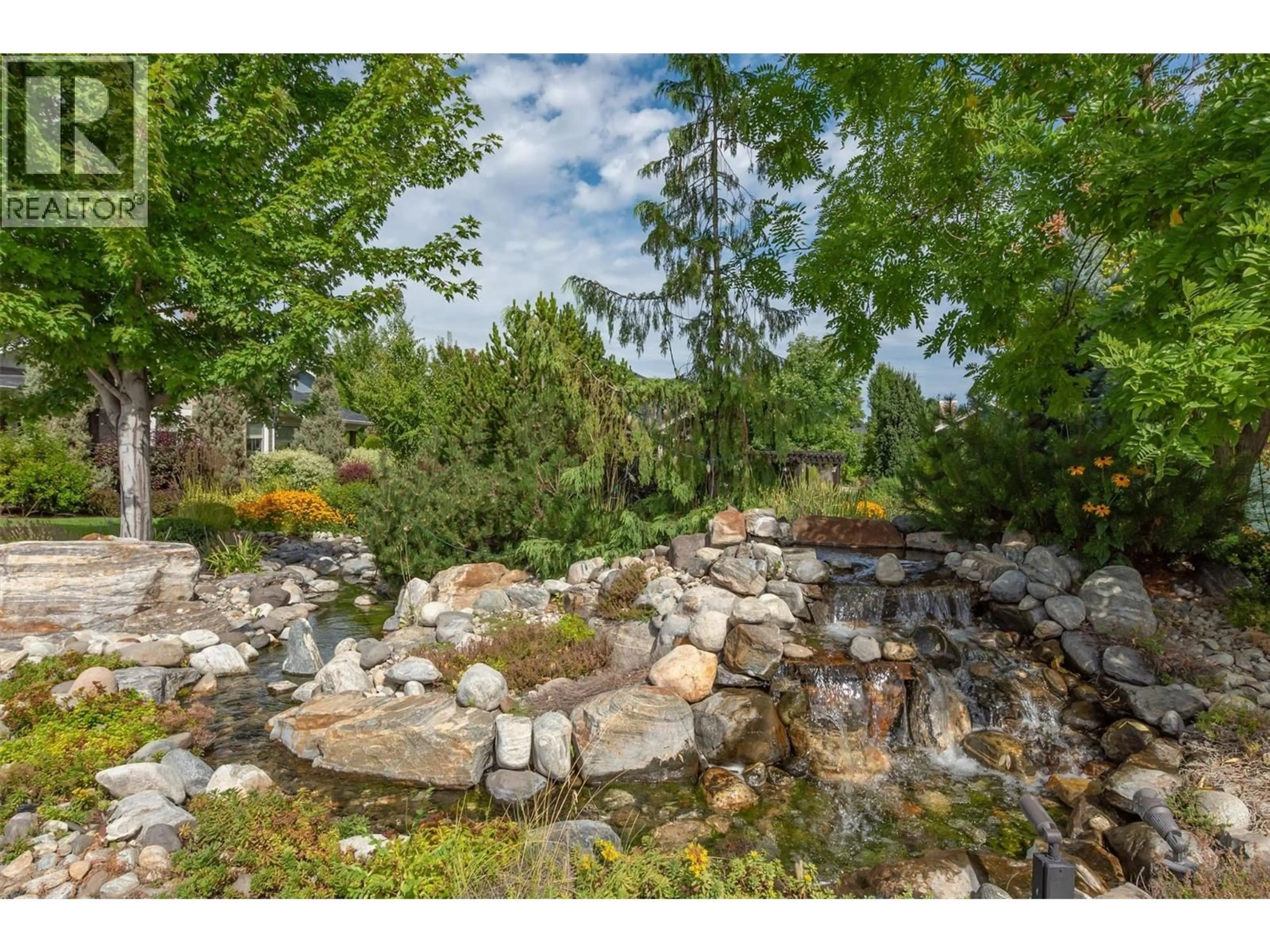 A pic from outside/outdoor area/front of a property/back of a property/a pic from drone, unknown for 62 - 1960 KLO ROAD, Kelowna British Columbia V1W5L2