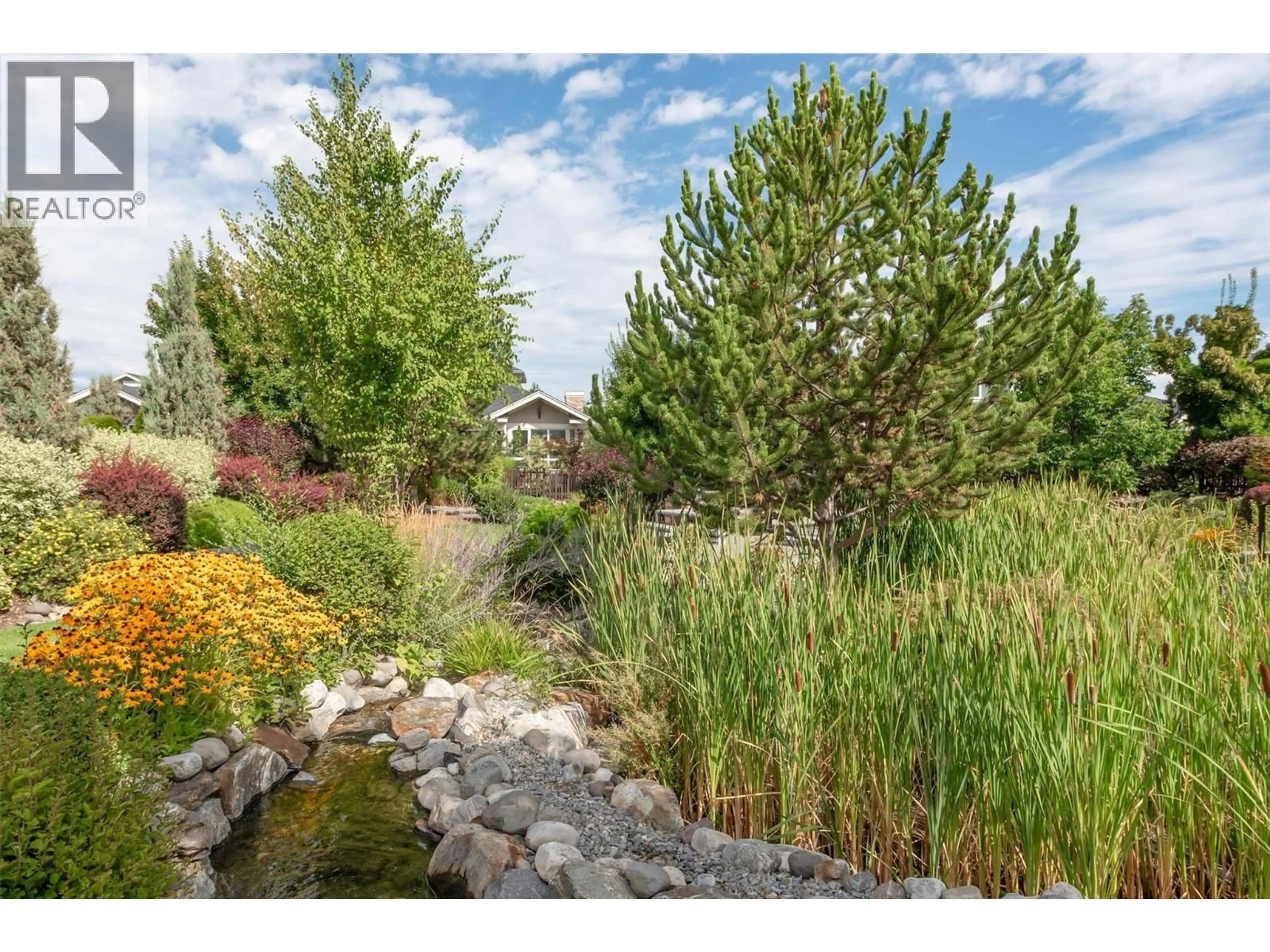 A pic from outside/outdoor area/front of a property/back of a property/a pic from drone, water/lake/river/ocean view for 62 - 1960 KLO ROAD, Kelowna British Columbia V1W5L2