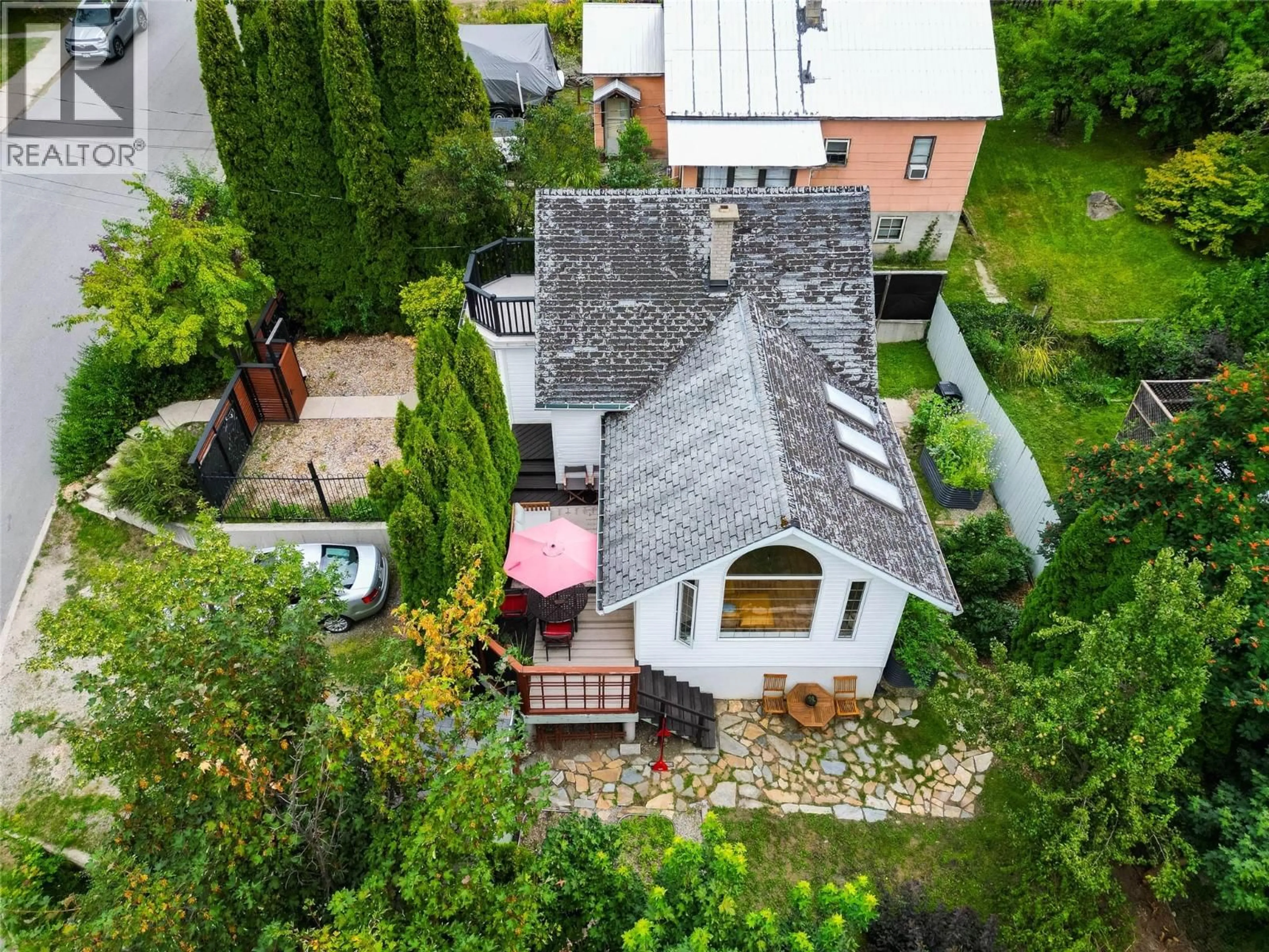 A pic from outside/outdoor area/front of a property/back of a property/a pic from drone, unknown for 106 RICHARDS STREET, Nelson British Columbia V1L5J5