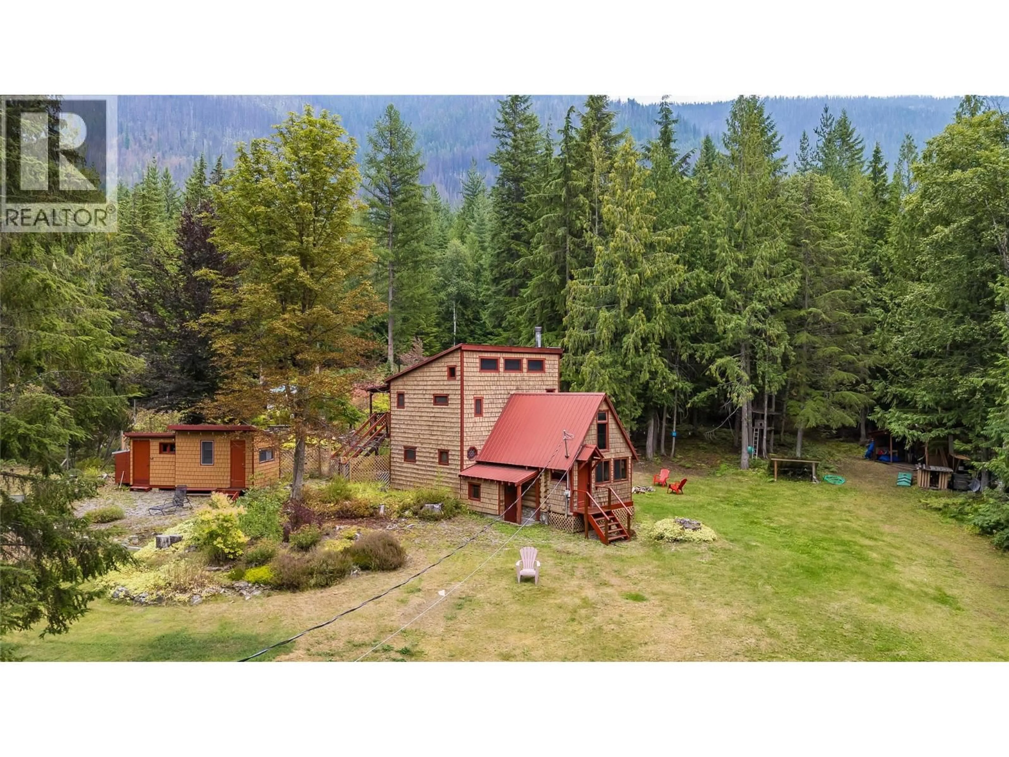 A pic from outside/outdoor area/front of a property/back of a property/a pic from drone, forest/trees view for 8780 MARTENS ROAD, Slocan British Columbia V0G2C0