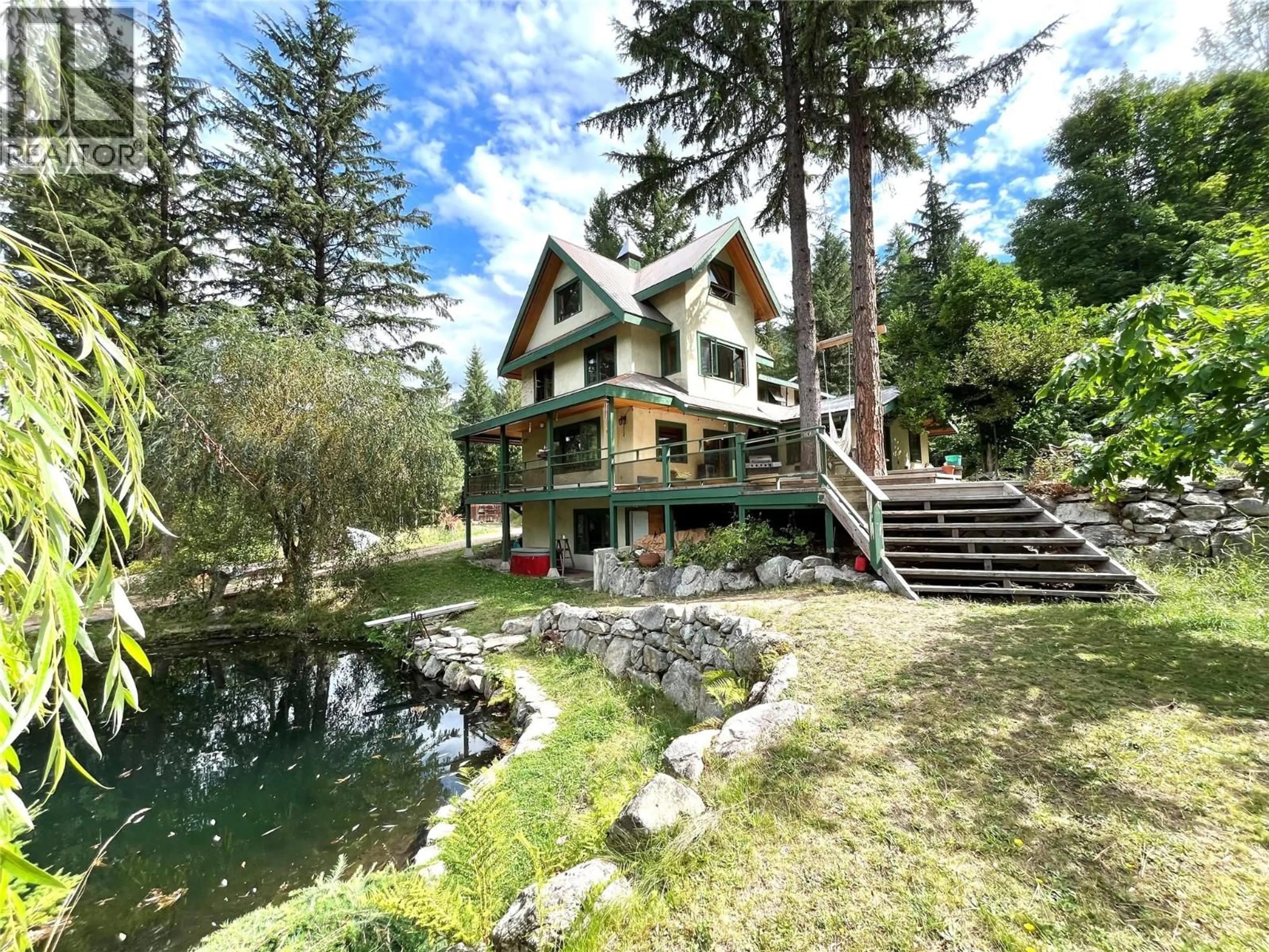 A pic from outside/outdoor area/front of a property/back of a property/a pic from drone, water/lake/river/ocean view for 7138 GRAHAM ROAD, Winlaw British Columbia V0G2J0
