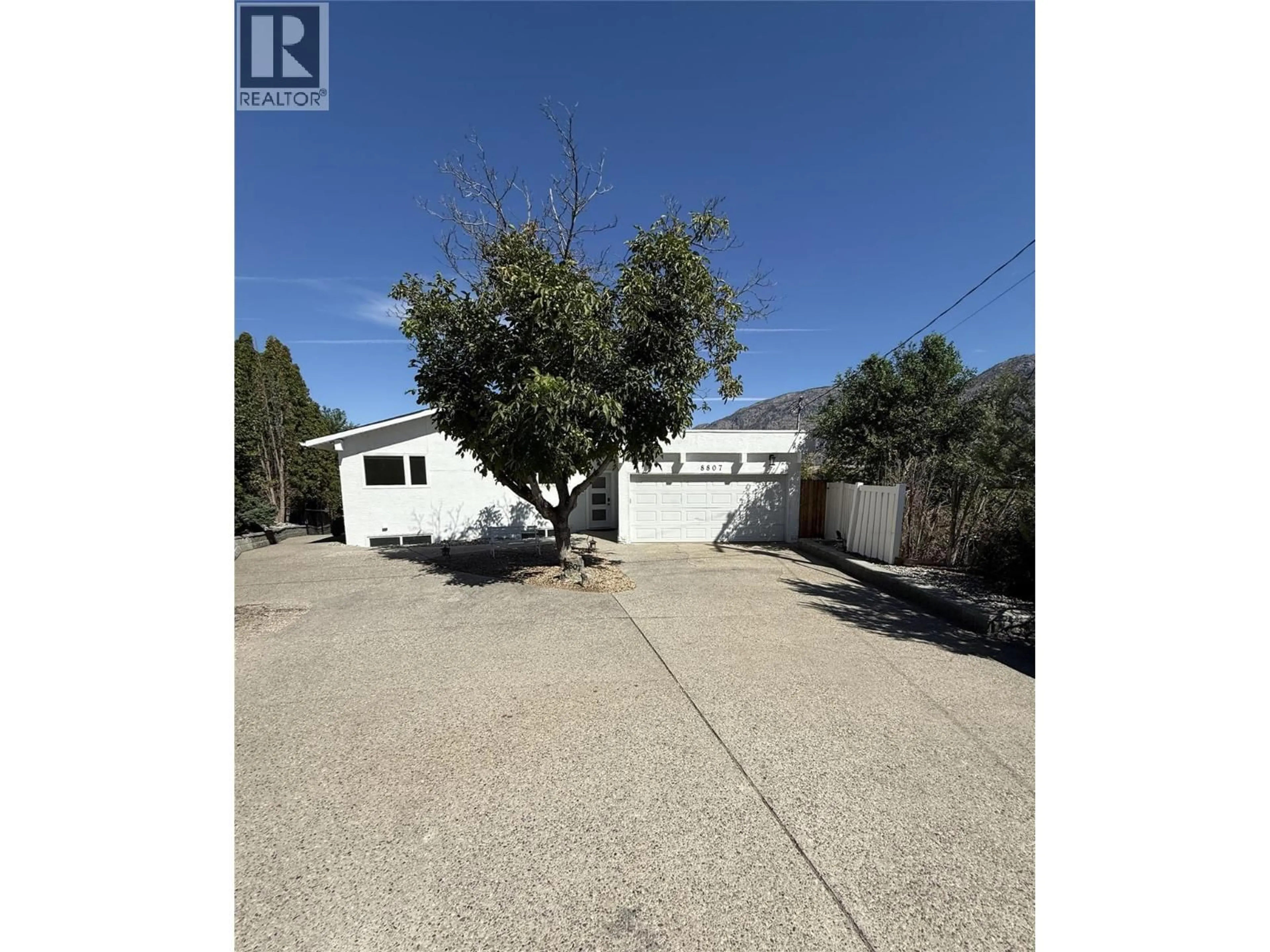 A pic from outside/outdoor area/front of a property/back of a property/a pic from drone, street for 8807 GALA CRESCENT, Osoyoos British Columbia V0H1V2