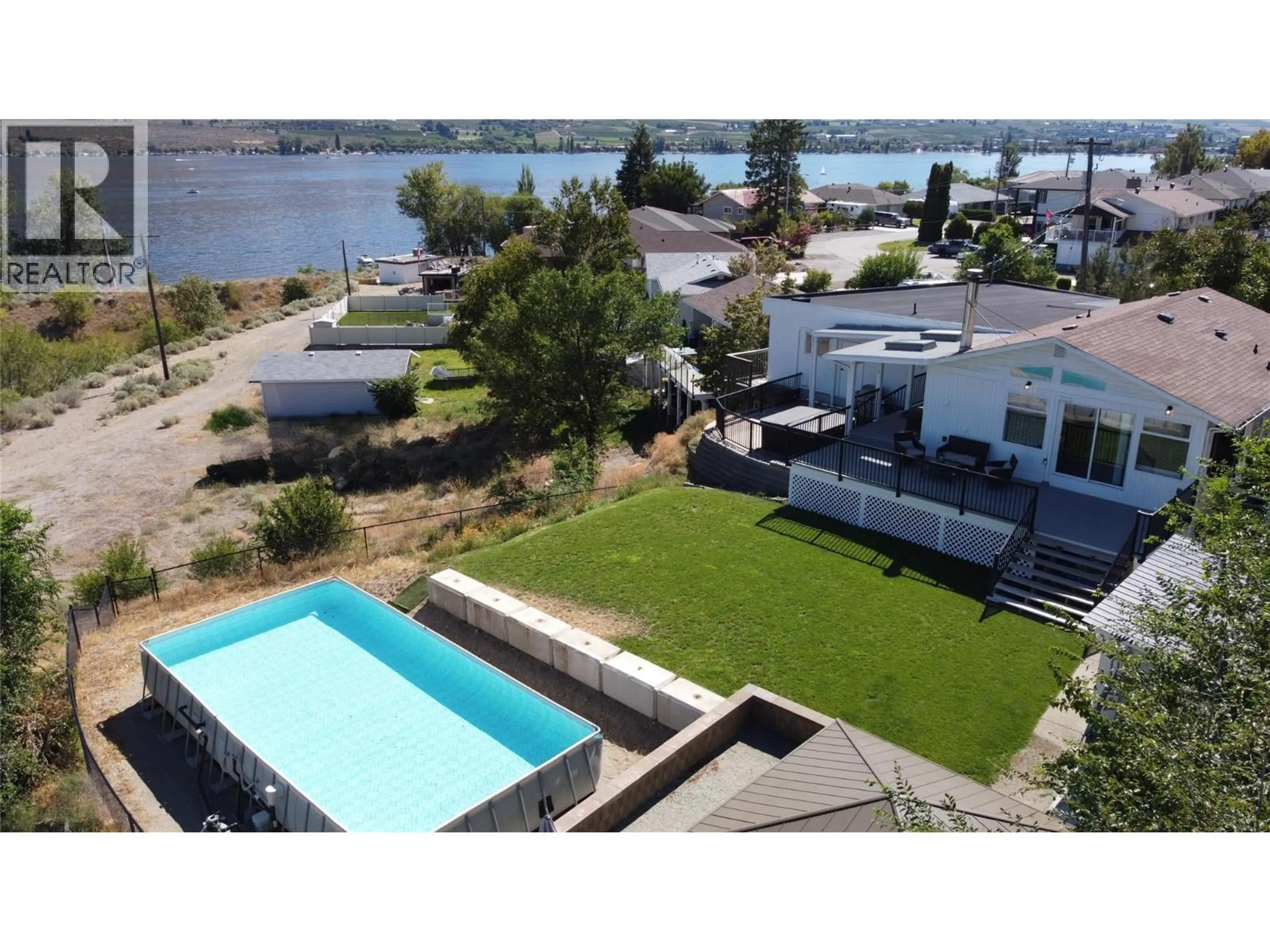 A pic from outside/outdoor area/front of a property/back of a property/a pic from drone, water/lake/river/ocean view for 8807 GALA CRESCENT, Osoyoos British Columbia V0H1V2