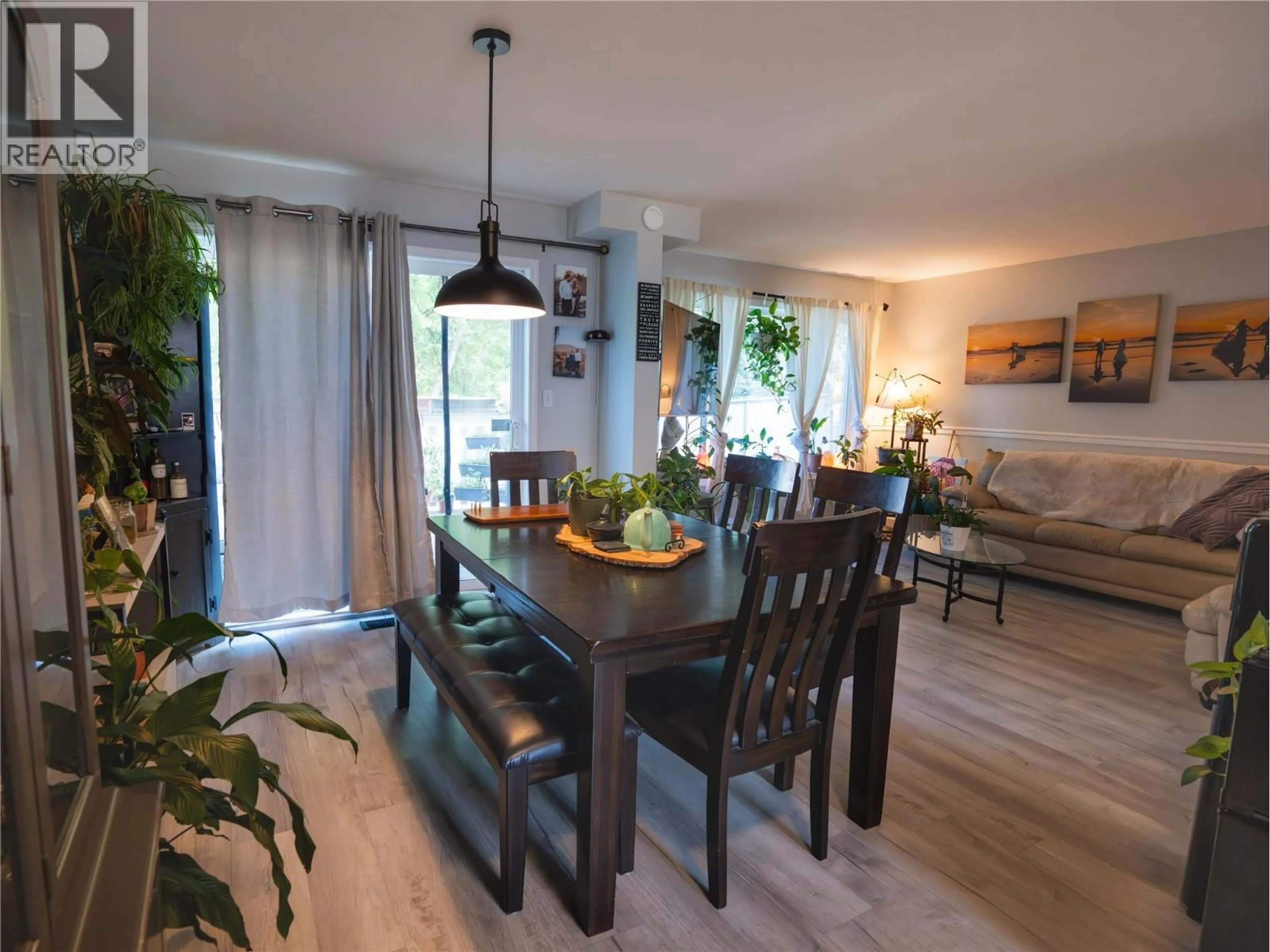 Dining room, wood/laminate floor for 107 - 1458 PENTICTON AVENUE, Penticton British Columbia V2A8l3