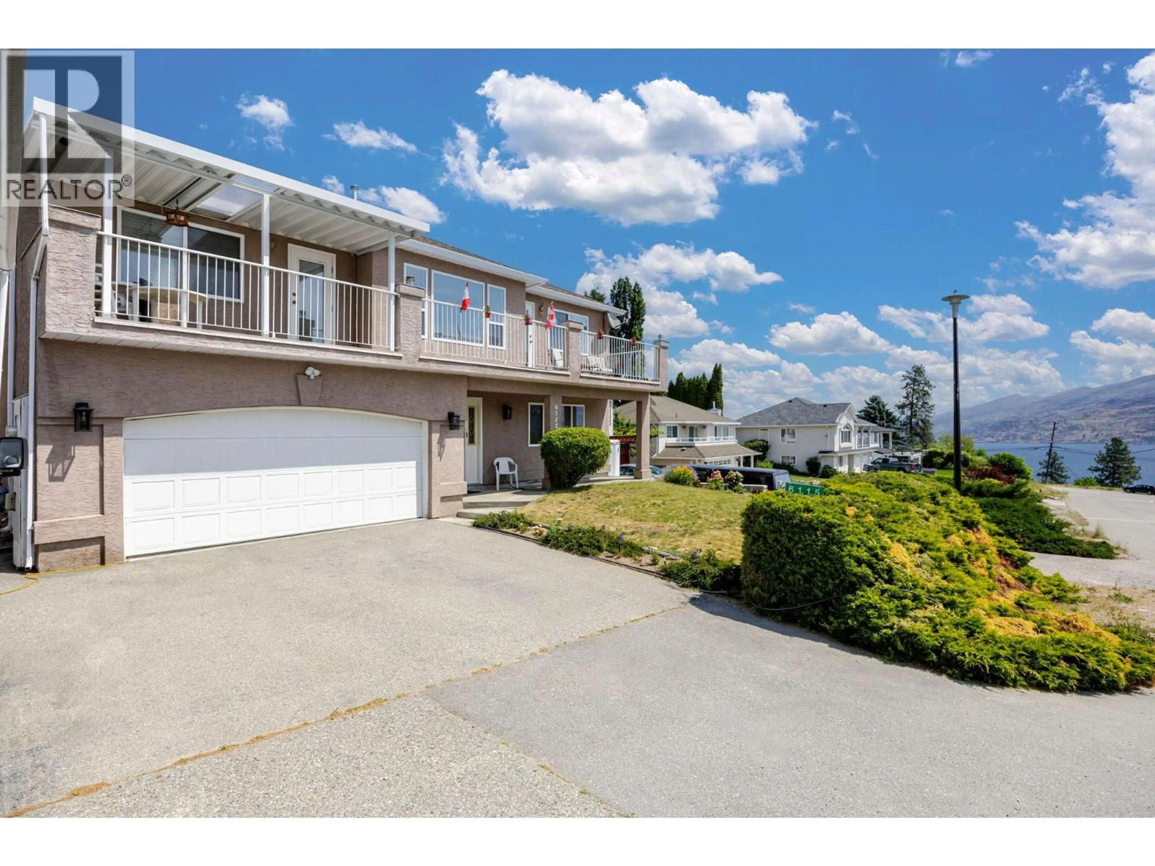 A pic from outside/outdoor area/front of a property/back of a property/a pic from drone, water/lake/river/ocean view for 6115 AITKENS ROAD, Peachland British Columbia V0H1X7