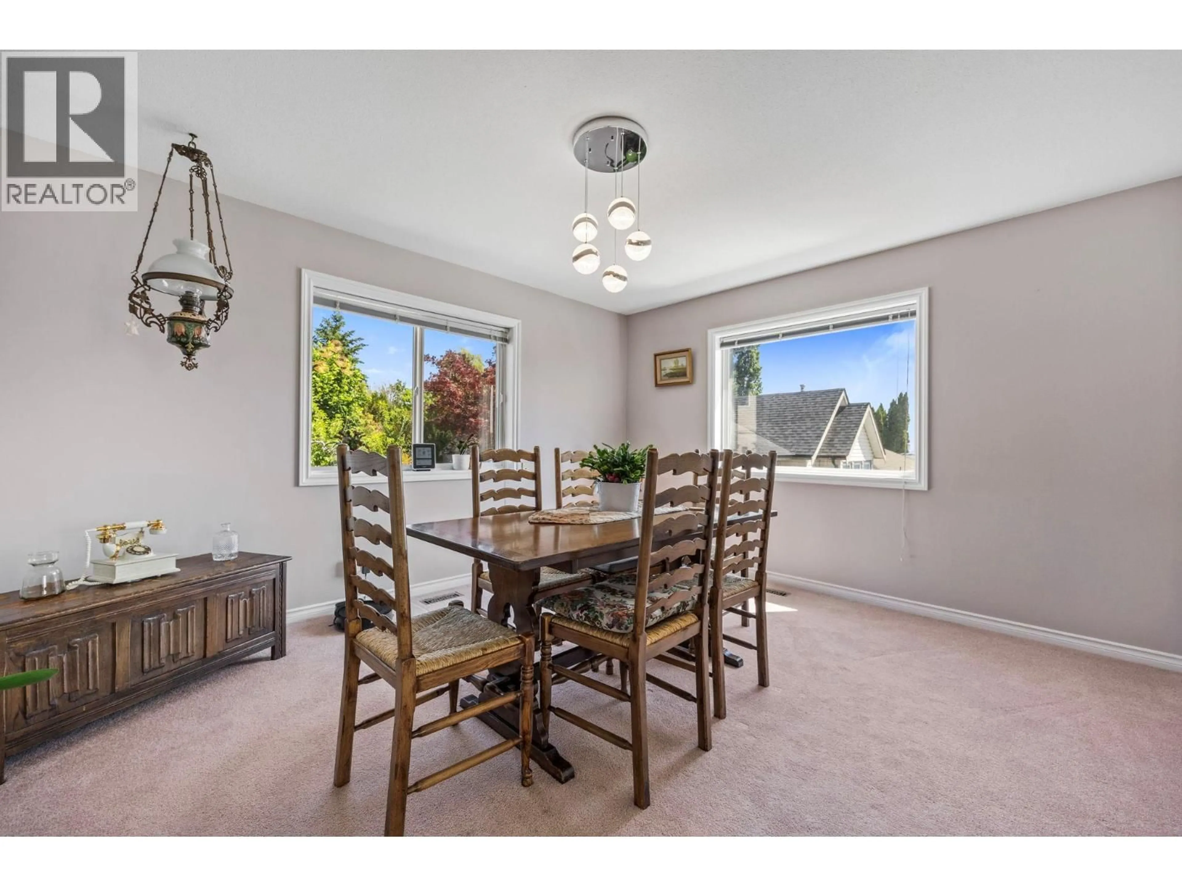 Dining room, wood/laminate floor for 6115 AITKENS ROAD, Peachland British Columbia V0H1X7