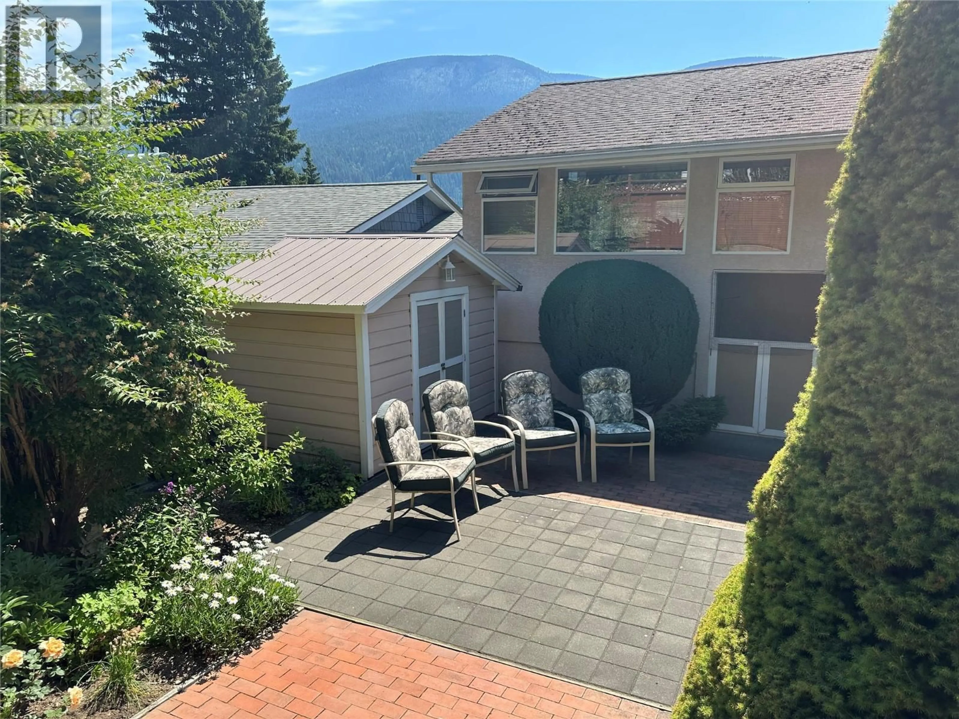 A pic from outside/outdoor area/front of a property/back of a property/a pic from drone, mountain view for 649 JOHNSTONE ROAD, Nelson British Columbia V1L6H8