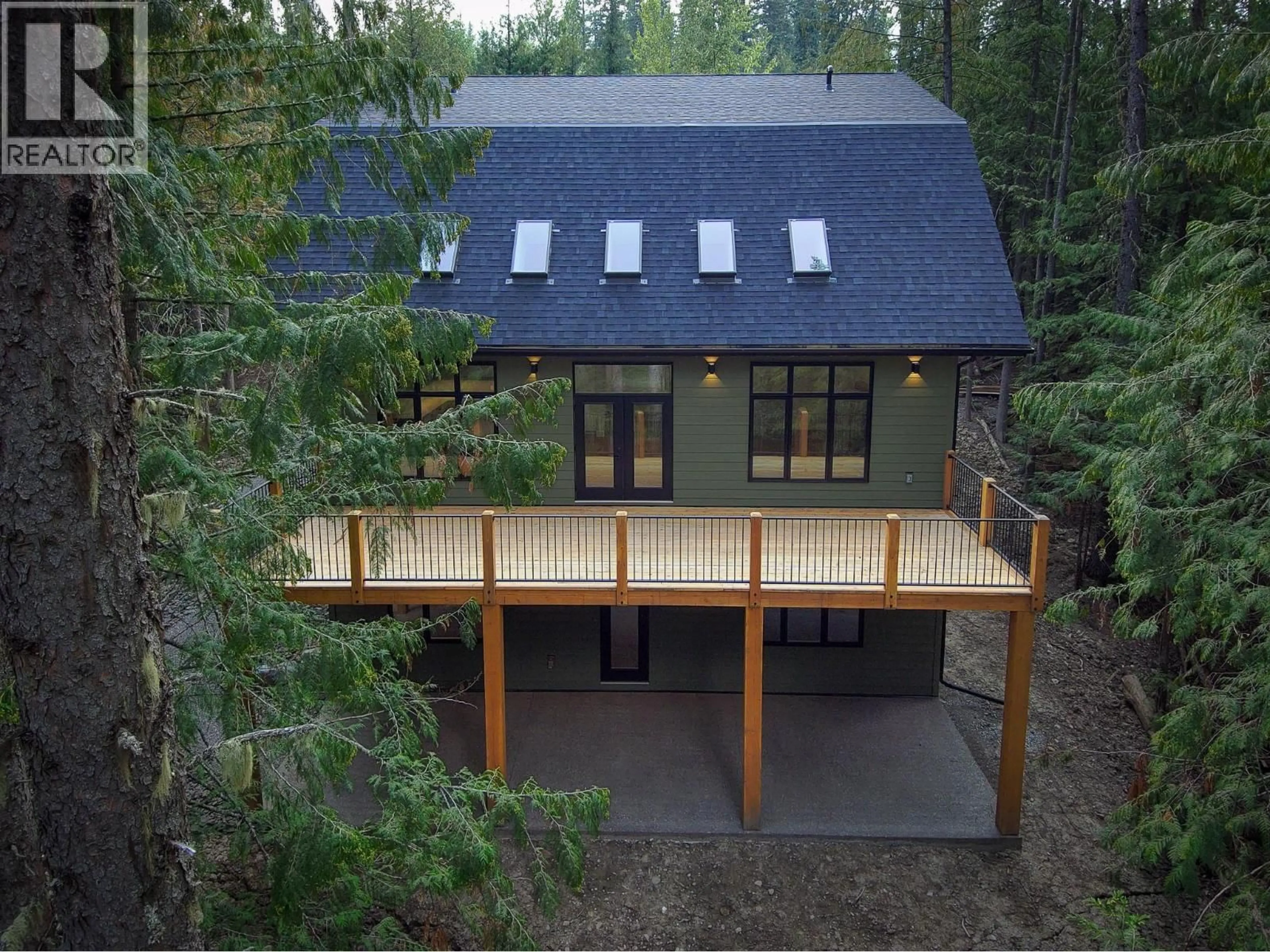 A pic from outside/outdoor area/front of a property/back of a property/a pic from drone, forest/trees view for 4416 TIMBERLINE CRESCENT, Fernie British Columbia V0B1M6