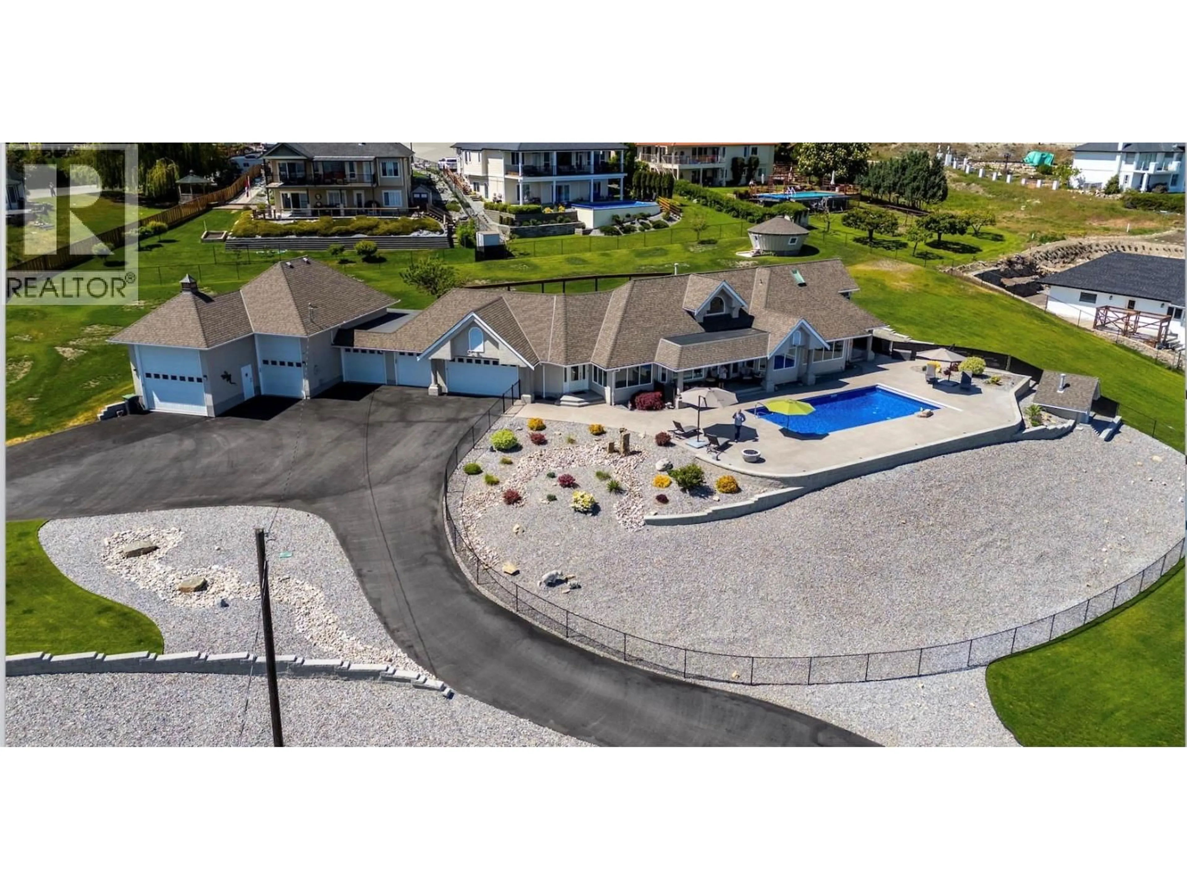 A pic from outside/outdoor area/front of a property/back of a property/a pic from drone, water/lake/river/ocean view for 6130 LIPSETT AVENUE, Peachland British Columbia V0H1X7