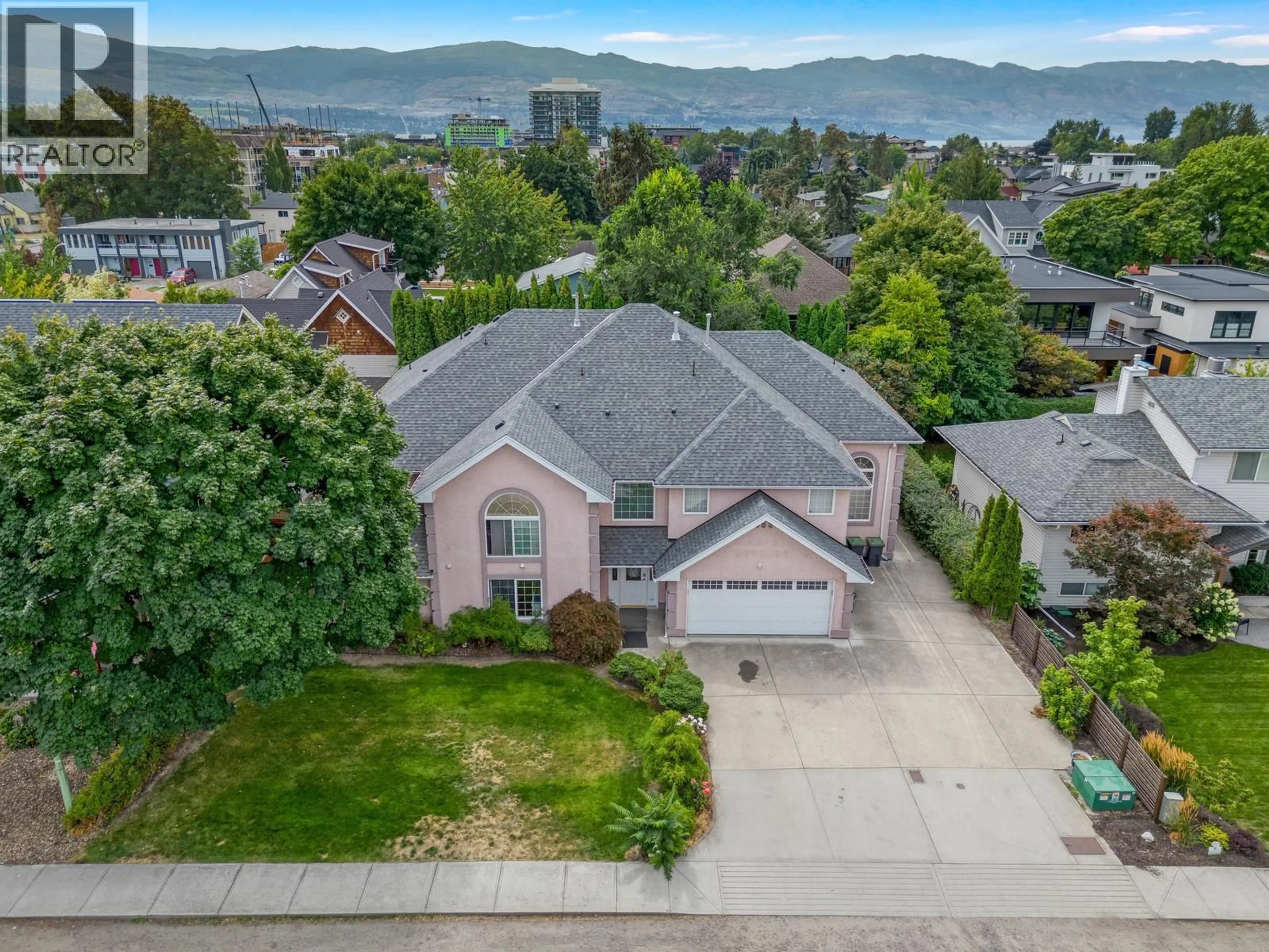 A pic from outside/outdoor area/front of a property/back of a property/a pic from drone, mountain view for 453 MORRISON AVENUE, Kelowna British Columbia V1Y5E1