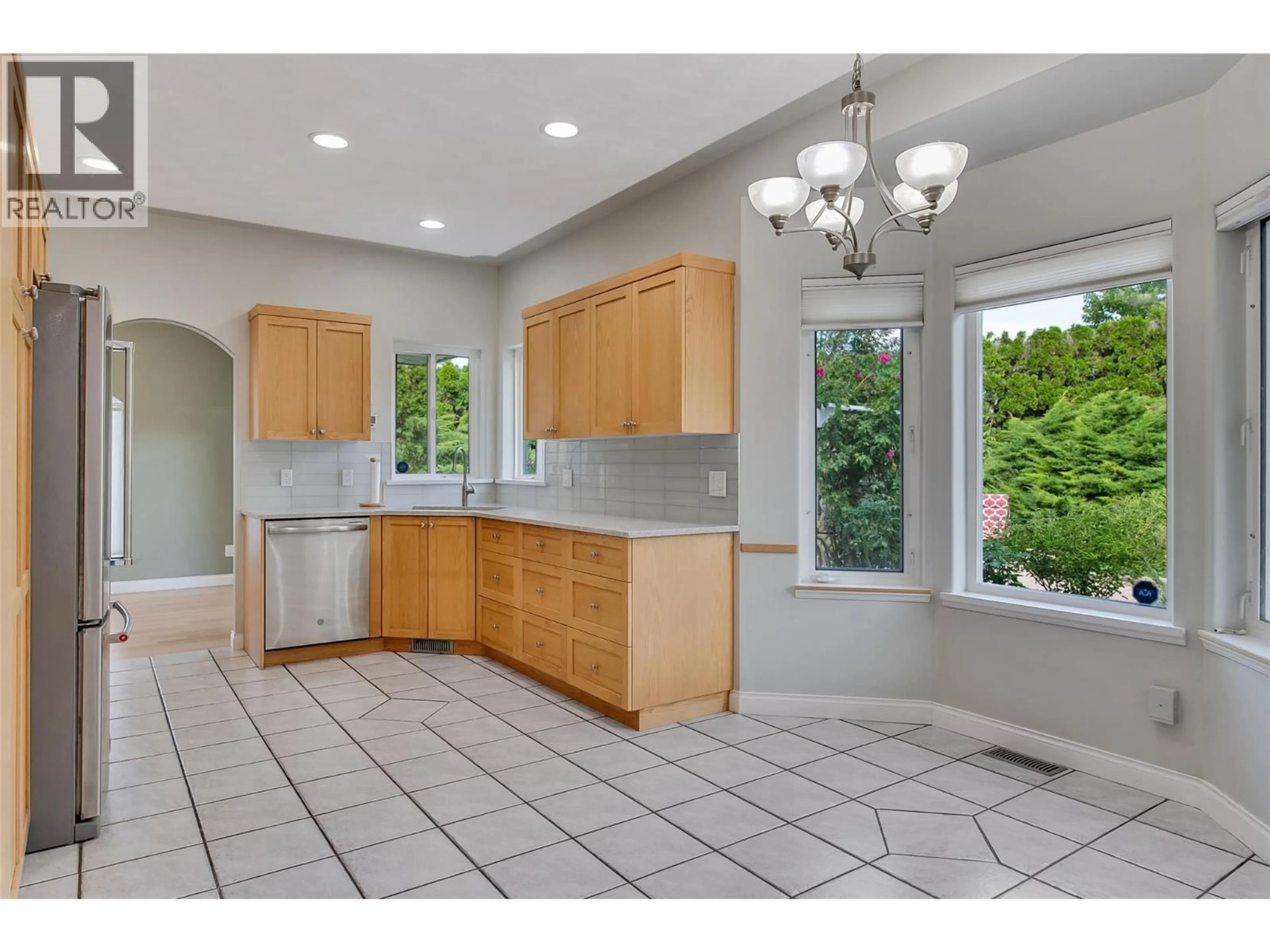 Open concept kitchen, ceramic/tile floor for 2317 TEAL PLACE, Vernon British Columbia V1H1R1