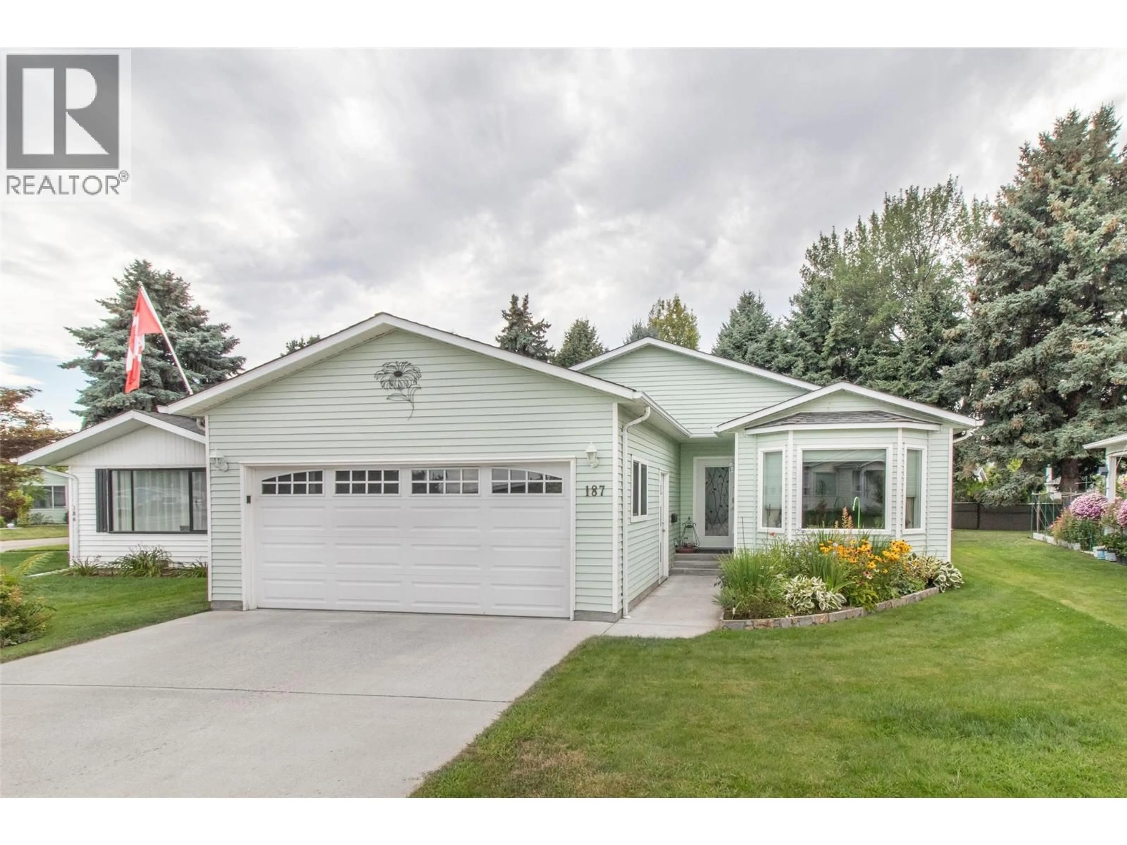 Home with vinyl exterior material, street for 187 - 1255 RAYMER AVENUE, Kelowna British Columbia V1W3S3
